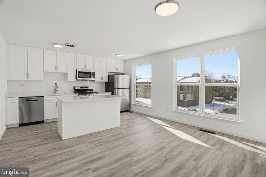 JUST ABOUT EVERYTHING IS NEW!!!  Big ticket items too!  New A/C, new windows, new floors, fresh paint, new appliances, new baths, new counters, new light fixtures... this house has been improved all over and is the definition of turn-key!  Also located in the heart of Baltimore near Johns Hopkins.  Close to shopping, dining, entertainment, major commuter routes and so much more!  Homes like this are very rare, so make an appointment today!