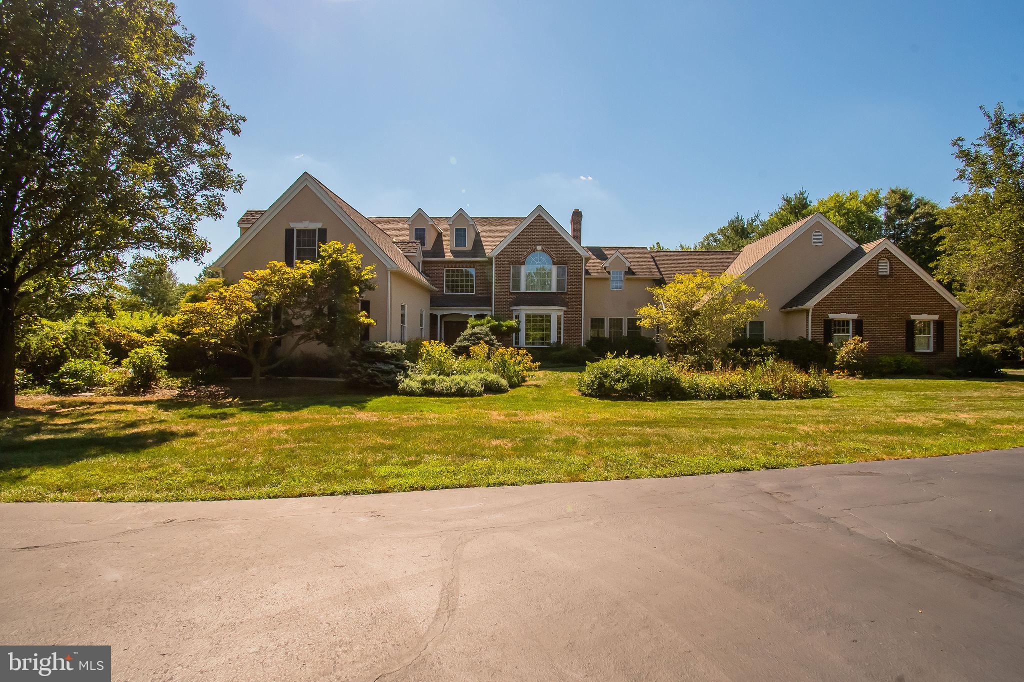 Welcome to 16 Weatherfield Drive! This beauty is situated on 2.89 acres in the private Weatherfield community. Custom built by Richard Zaveta in 1992 however the current homeowners have taken great pride in their ownership over the last 15 years with many upgrades throughout and very well-maintained. As you pull up the driveway, you'll notice right away it splits off to two entries to the home. A complete in-law suite can be found on the entry level featuring it's own 2-car garage, it's own basement, a separate bedroom and full bathroom on the left side of this home. Pull around the front and you are greeted by double wooden doors opening into a gorgeous two-story foyer. Natural light pours through the many tall windows throughout the home. Open flow as you walk into the Gourmet kitchen with a long eat-in island overlooking a breakfast area and the family room right off the formal dining room. Spacious office/den area on the main floor. French doors leading out back to the private large deck area overlooking the backyard and complete with a hot-tub. Back inside you'll find a large game room off the in-law suite area. Head up the staircase to find a massive master suite featuring a sitting room, private balcony, large walk-in closet, and master bathroom. Three additional oversized bedrooms and two additional full bathrooms are found on this upper level. More expansion possibilities with the large attics. A finished basement area gives even more additional living space with a walk-out area. Enjoy your own private oasis overlooking the large backyard and mature tree lined property. So much detail to take in, you will want to see for yourself!