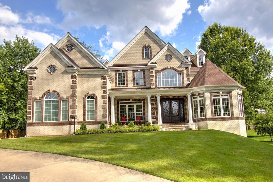 Prepare to fall in love with this spectacular 10 year old home on half an acre on one of the prettiest streets in Vienna!  This beauty has about 7000 finished square feet of finished space plus a 3 car garage. The owners custom built this beauty using selections from right here in Vienna!  For example, the stunning front doors came from a business on Mill Street.  And the lighting was purchased from the Versailles Design Center.  
You'll love the  10 foot ceilings on the main level and all the beautiful windows - it's so light and inviting!  There are 5 bedrooms and 4 full baths on the upper level plus 2 more bedrooms and a full bath on the lower level.  The main level library has a closet so it could definitely be a bedroom.  The powder room right next to the library has room to add a shower if you ever want a main level bedroom and bath.  Walk through this home right now by clicking the "Tours" button to access the 3D Matterport tour. 
The fantastic location is on a gorgeous quiet street, and is an easy walk to both Flint Hill Elementary school as well as to Madison High!  So convenient.  Just 2 miles from the Vienna subway station.  This area of Vienna enjoys large half acre lots and several homes on Sunrise, Rambling, and Flint Hill have sold in the mid to high $2 M's.   What a fantastic combination of a spacious and beautiful home on a gorgeous large level lot in an ideal location.  It's time to make your move!