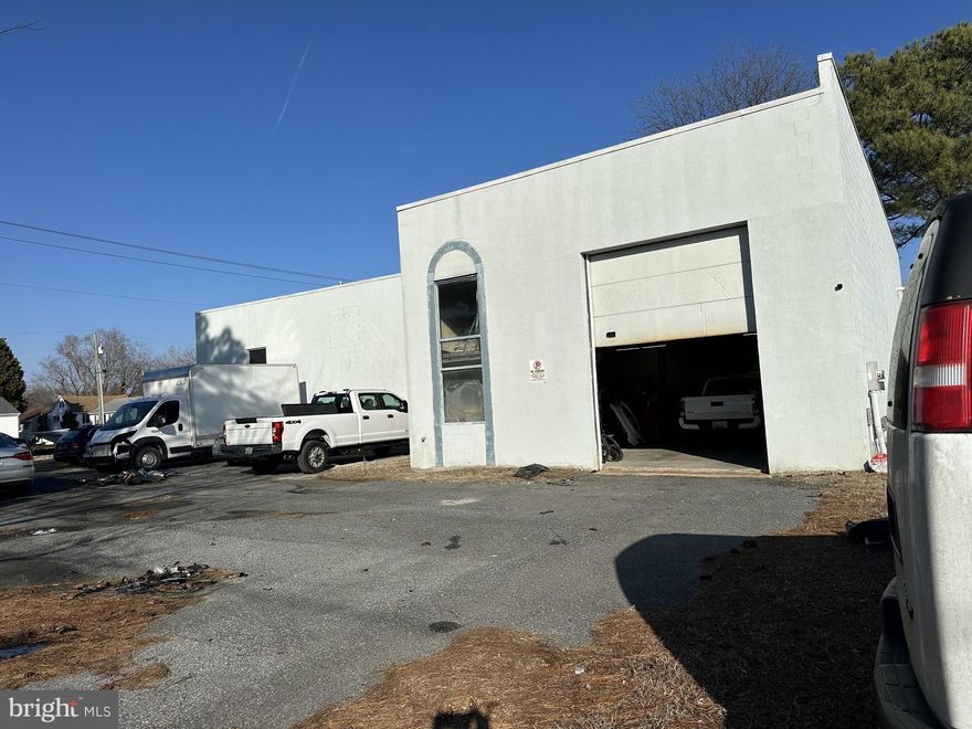 4,602 sq.ft. flex / garage facility with 4 drive-in doors. New LED lighting. 3 phase power. Small office and restroom. Paved parking. Located in central Salisbury with access from Priscilla Street & Carey Avenue. General Commercial zoning allows a wide variety of uses and the flexible layout of this building allows for easy conversion to other uses. Includes two parcels for a total land area close to 3/4 of an acre.    Roof is 19 foot and 3 overhead doors are 16 feet, 1 overhead door is 8.

- 4,602 SQ FT on almost 3/4 Acre
- Corner location
- 4 Drive-in Doors