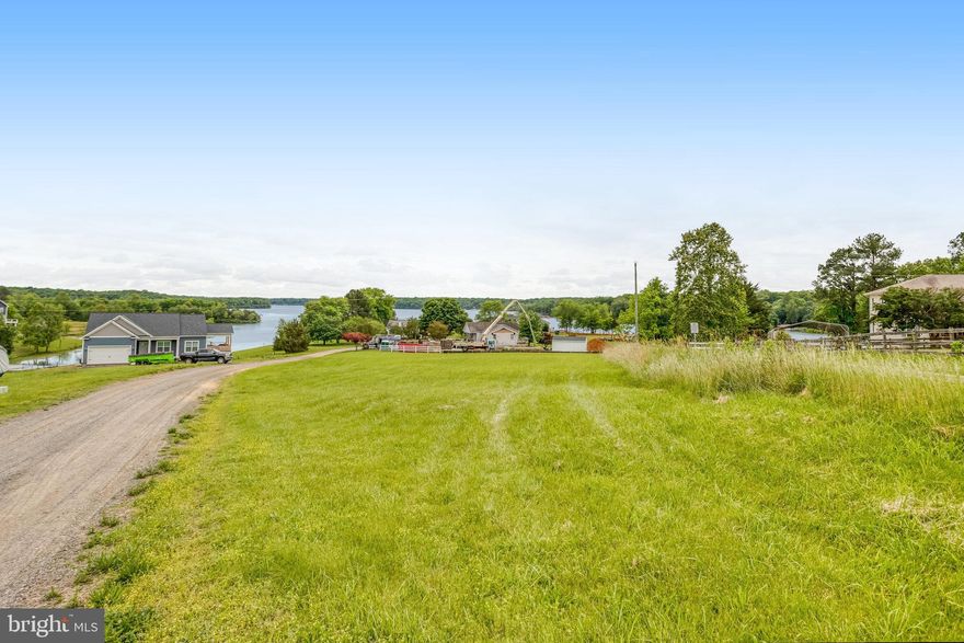 Lake View, Water-Access Lot at Lake Anna! Don’t miss this incredible opportunity to own a cleared, 1-acre lot with stunning lake views and water access in the heart of beautiful Lake Anna. Build your dream home and enjoy year-round recreation including fishing, kayaking, jet skiing, and boating—right in your backyard! Located in a vibrant and quickly developing area, this property offers not only natural beauty but also the chance to be part of a welcoming and growing community. Whether you’re looking to build a weekend retreat or a full-time residence, this lot is the perfect place to start your lakefront lifestyle. Enjoy a short boat ride to The Sandbar, where summer brings an annual glow party, floating volleyball setup, and concerts with a floating stage. With six marinas accessible to you by boat, you don't even have to leave the water for all of your boating necessities. Savor the local dining and entertainment options, all just a boat ride away: indulge in seafood at Tim's at Lake Anna, enjoy outdoor seating at The Cove (short boat ride), catch live music and events at Lake Anna Taphouse, or join the festivities at El Gran Patron at Pleasants Landing, such as the Father's Day car show. The area is also home to the Mineral Farmer's Market, only a 14-minute drive away, and amazing 4th of July fireworks that light up the sky, best viewed from the water. Surrounded by farmland, this tight-knit community offers a small-town, rural feel with all the amenities you could ask for. Local farm stands are open year-round, and nearby breweries are just a short drive away. Centrally located, you're only 45 minutes from Fredericksburg, an hour from Charlottesville, and an hour from Richmond, giving you the perfect balance of peaceful living and easy access to city conveniences.