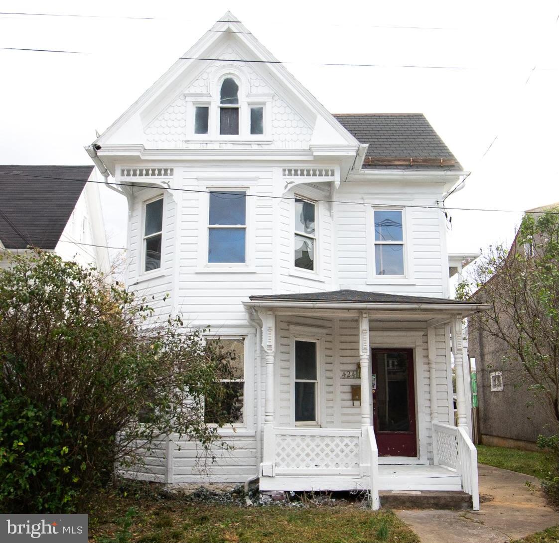 This is a great investment opportunity that needs some TLC! The outside of the house, garage, and shed have all been freshly painted! This beautiful 3-bedroom home comes with a 2-bedroom apartment that has a separate outdoor entrance. You can live on one side and rent out the other for additional income. The property also features a large storage shed and a detached garage, which can provide more storage space or even more rental income. The property is being sold "as is". Don't miss out on this wonderful opportunity with great income potential! Buyer to verify all information.