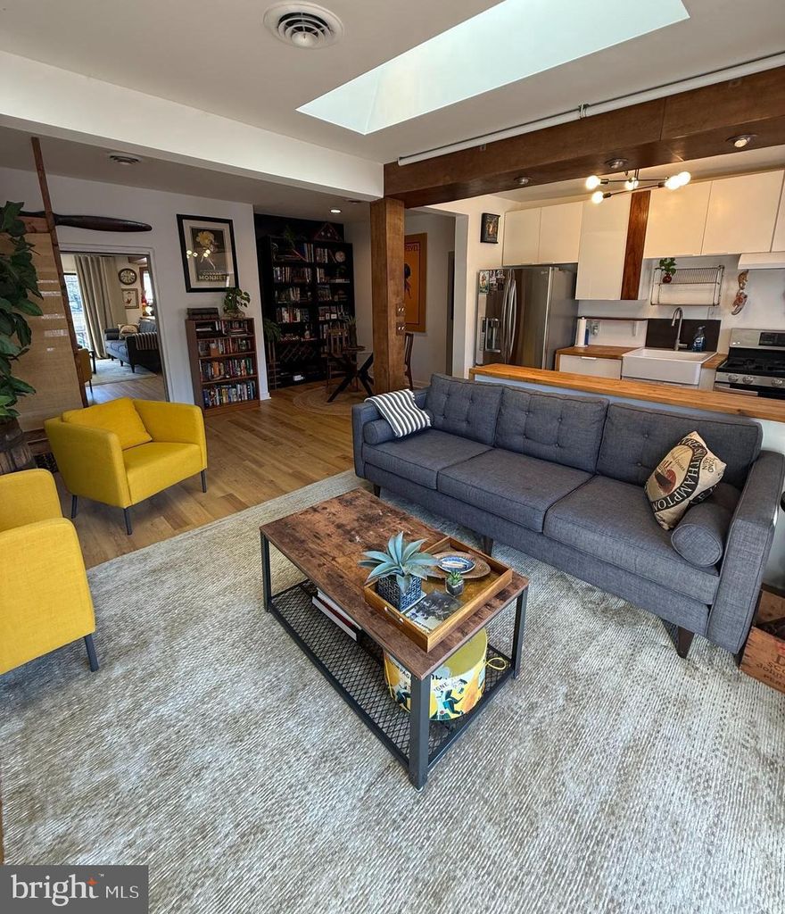 This charming top-floor condominium, offers 879 sq ft of updated living space. Featuring an open-concept kitchen with modern cabinets and appliances, fresh painted walls,  skylights that flood the interior with natural light, and a private balcony, this home is both stylish and functional. The remodeled bathroom and spacious master bedroom with a customized walk-in closet add to its appeal. Conveniently located just 1.2 miles from King Street Metro and Old Town Alexandria’s shops and restaurants, this condo provides a perfect blend of comfort and convenience.