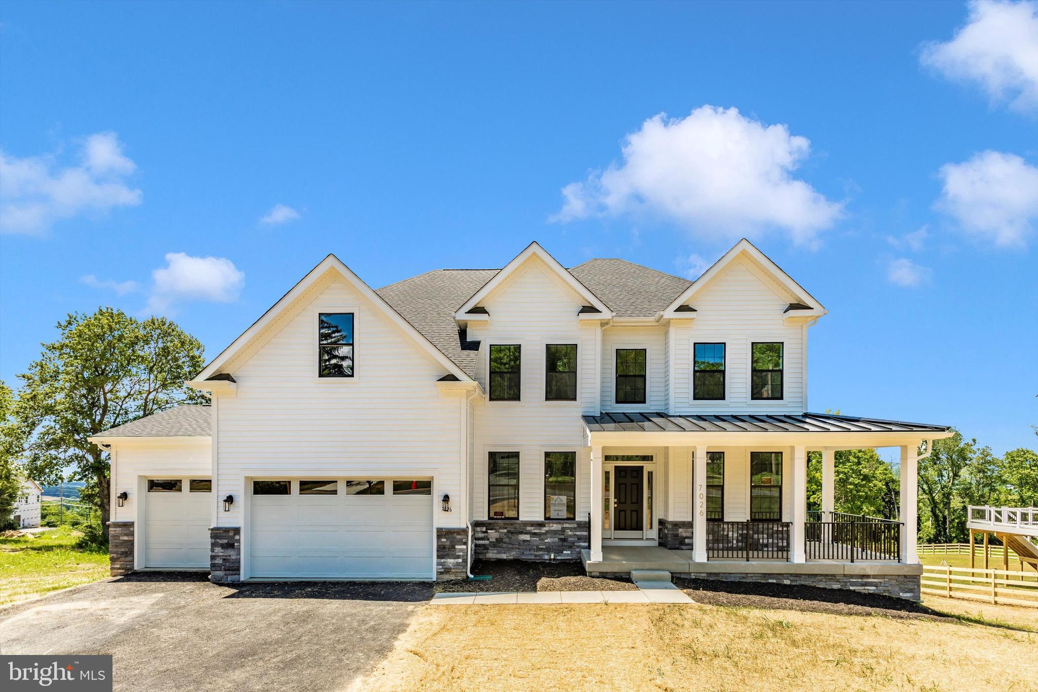 PDR Homes is offering house packages at Americus Manor, a private subdivision featuring three lots within the Middletown school district. The subdivision is adjacent to over 135 acres of parkland, ensuring serenity and seclusion. The pricing shown is for The Berkeley model on Lot 2, a 2.37-acre partially wooded lot with an approved septic and existing well. PDR Homes is the exclusive builder at Americus Manor. The photos showcase some of the house designs offered, which can be customized to fit your preferences.