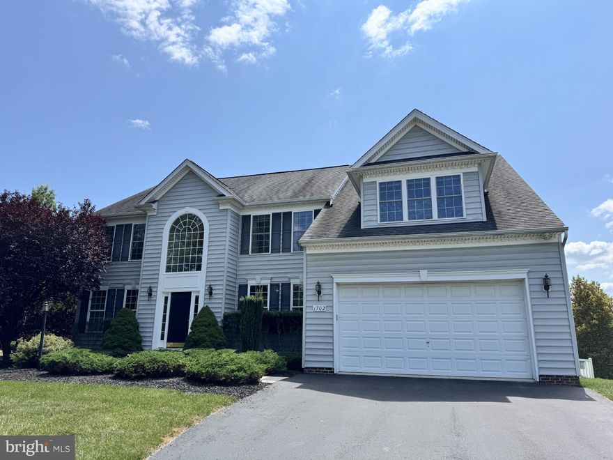 Nestled in the prestigious Sterling Glen community, this stunning Colonial-style home offers over 5,000 sq ft of total finished living space (3,703 sq ft above grade) and seamlessly blends classic charm with modern comfort. Featuring 4 spacious bedrooms, 3 full bathrooms, and 1 half bath, this home includes a formal living room and dining room, along with an open-concept family room centered around a cozy fireplace. The gourmet kitchen is a chef’s dream, boasting granite countertops (2019), a large island, stainless steel appliances—including double ovens, microwave(2019) and dishwasher (2019), and a new refrigerator (2024). The expansive primary suite offers two walk-in closets and a luxurious bathroom with a soaking tub, dual vanities, and a separate shower. The fully finished walkout basement is an entertainer’s dream, complete with a two-level movie theater, a bar area with sink, a full bathroom, and new carpet (2024). Outside, enjoy your private oasis on a beautifully landscaped half-acre lot, featuring a spacious deck and patio connected to the basement walkout, a fully fenced yard (2018), and a stunning in-ground pool (2018). Numerous recent improvements include refinished hardwood floors on the main level (2024), new washer and dryer (2019), hot water heater (2020), and various kitchen upgrades. With access to community amenities like playgrounds and picnic areas, this exceptional home offers the perfect blend of luxury, space, lifestyle, and thoughtful updates throughout.