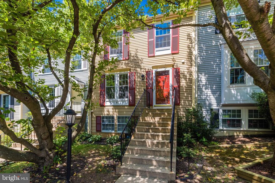 Welcome to this beautifully updated townhome in Reston, VA, featuring 3 bedrooms and 2.5 baths. This home backs to woods, providing a very private and serene setting. The fenced-in backyard with a patio offers a perfect outdoor space for relaxation and entertainment. With two parking spaces conveniently located in front of the unit, you'll have ample parking for you and your guests. Inside, the gourmet kitchen boasts stainless steel appliances, updated cabinets, and granite countertops, making it a chef's delight. The main and upper levels are adorned with elegant hardwood floors, while the basement features durable luxury vinyl plank flooring, adding to the home's modern appeal. The open floor plan creates a spacious and inviting atmosphere, perfect for both everyday living and entertaining. Updated bathrooms add a touch of contemporary style and comfort. This home is ideally located close to Reston Association pools and soccer fields, providing plenty of recreational opportunities. Additionally, it's just a short distance from North Point Shopping Center, grocery stores, a variety of restaurants, and the vibrant Reston Town Center.  Ready for immediate move-in, this townhome is looking for tenants who meet application qualifications including a gross income of at least three times the annual rent, a minimum credit score of 650, a clean background check, no previous evictions, and accounts in good standing. Pets are welcome with a weight limit of 50 pounds. Don't miss the opportunity to own this exceptional townhome that combines modern amenities, privacy, and a prime location. Schedule your tour today and experience the best of Reston living!
