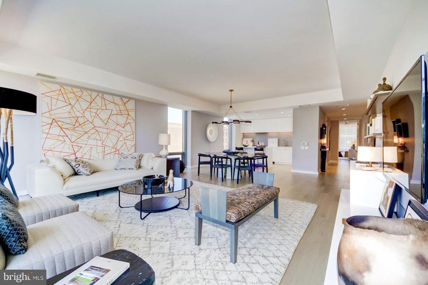 FULLY FURNISHED DESIGNER MODEL, MOVE-IN READY!

Welcome to "The Power & Politics Building". This expansive 3BDR/3 BA is available in Eastbanc's newest luxury project, The Westlight.  This unit boasts floor-to-ceiling window walls, Euro chic Italian kitchens with natural gas cooktops and spa inspired bathrooms with IPE teak shower floors and ToTo toilets.  This wide open floor plan is perfect for entertaining! Unit includes separate service entrance. 

The professionally staffed 24-hour front desk concierge, uniformed doorman and porter, onsite engineer and building manager ensure effortless city living. An expansive rooftop grilling terrace, private clubroom with catering kitchen, state-of-the-art fitness center and D.C.'s only 25-meter heated rooftop pool provide residents with a perfect backdrop to check in or out with the rest of the world. Perfectly situated just steps from Georgetown, Dupont Circle and Downtown A LEED gold certified building exceptional in design and livability, Westlight is a breath of fresh air. Unlike most buildings, Westlight does not have recirculated air. A sophisticated HEPA grade air filtration system delivers fresh air into each unit directly from the outdoors. The triple glazed windows have a sound dampening factor higher than airports, ensuring a quiet sanctuary in the heart of the city.