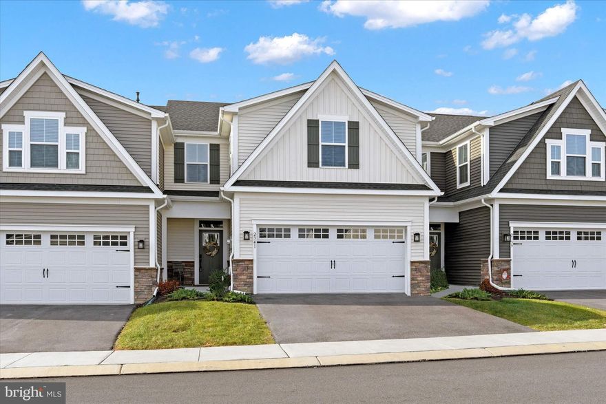 Welcome to 2341 Caroline Lane, nestled in the highly sought-after 55+ Blue Ridge Park community. This meticulously maintained home features 3 bedrooms, 2.5 baths, and an open floor plan designed for comfortable, modern living. The first floor boasts luxury vinyl plank flooring, a stunning primary suite with a tray ceiling, a walk-in closet, and a luxurious master bath featuring double sinks with quartz countertops and a beautifully tiled shower. The convenience of main-level laundry adds to the ease of daily living. Step outside onto the covered composite deck, complete with a ceiling fan and recessed lighting, perfect for relaxation or entertaining. The kitchen is a chef's delight, showcasing quartz countertops, a stylish tile backsplash, and a pantry for added storage. Upstairs, you’ll find two generously sized additional bedrooms, one featuring a walk-in closet, along with a second-floor bath with ceramic tile and quartz counters, combining comfort and style. The unfinished basement offers endless possibilities for customization.  Additional highlights include a front-entry 2-car garage, a tankless water heater for energy efficiency, and proximity to shopping, dining, and easy access to I-81. This is not just a house—it’s a lifestyle. Come see this exceptional home and experience the joy of Blue Ridge Park living!