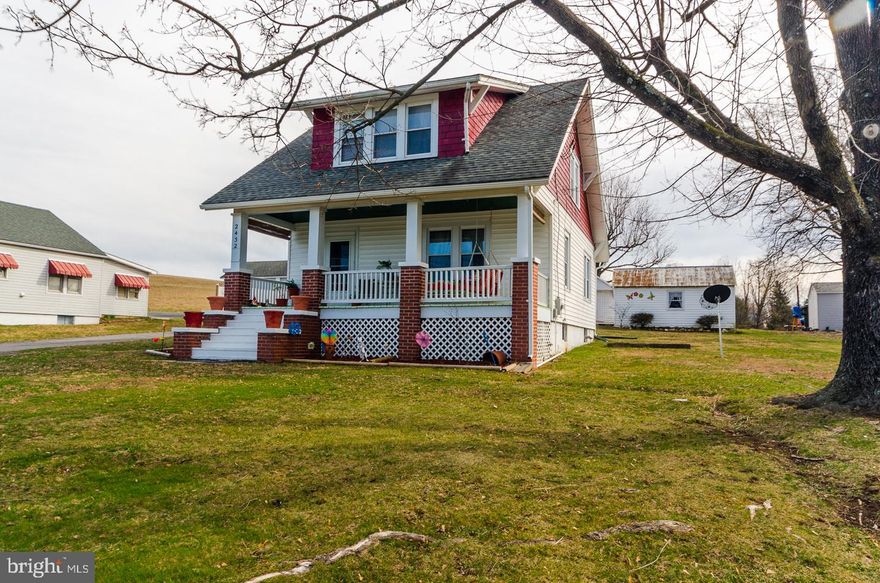 Lovingly Maintained, Turn Key.  3 bedroom, 2 Bath Cape Cod on .41 acre lot just 2 miles from downtown Berkeley Springs. Hardwood Flooring, original moldings and doors throughout, full basement, one care garage and outbuilding,This home will bring a smile so take a look today.