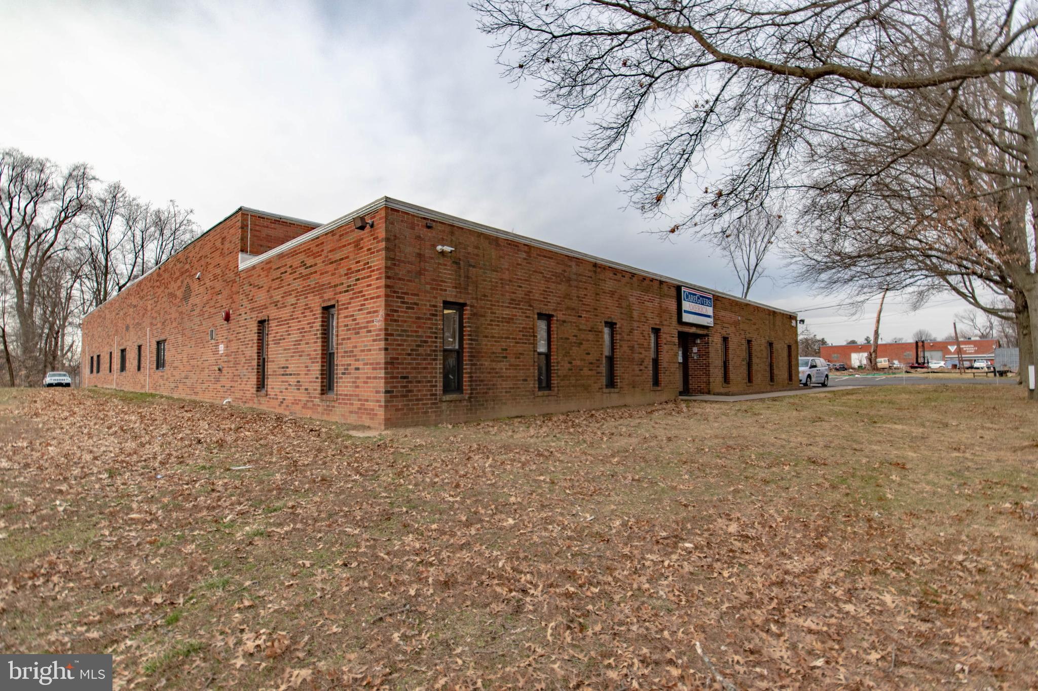 Investment opportunity! Current tenants include: a Major Home Health Agency with Lease agreement through 2021 and Camera Shop with lease Agreement as well. This commercial property is in great condition and offers plenty of space for additional leases. The main entrance of the Home Health Agency, opens to a large waiting room area (51x24) with a reception desk and 2 private offices with hardwood flooring (both 14x12). A long hall off of the waiting/office area features a large employee/break room to the left (19x12), 2 bathrooms to the right and an oversized garage/storage room w. garage door.Further down the hall, on the left hand side is an open office nook (25x15) which features 3 private offices (all 11x8) and a spacious area for additional desks if need be. Down the hall a little further is ANOTHER office nook (25x15) w. 3 private offices on the right side of the room also, private offices offer hardwood flooring! (all 11x8) The long spacious hallway offers plenty of space for additional desks or storage of any kind. At the end of the hall are double doors which lead into a giant Conference Room / Banquet Hall, with large windows, carpet flooring and an emergency exit which leads to the side of the building. To the right of the receptionist area is an additional bathroom, access to the opposite side of the garage/ storage room and a walk-in closet area for additional storage and yet another open area/office (26x22). 4 additional private offices and a conference room finish off this side of the building. Office 1 (12x9) Office 2 (12 x9) Office 3 (11x8) Office 4 (22x12) Conference/Meeting Room (15x11).On the side of the building is a successful Camera Shop, with current lease. The camera shop features a spacious display room with built-ins showcasing merchandise. Behind the wrap around counter is a large glass window which separates the display room from the large developing room, the back room is an open area which is currently used for storage. This is a great investment opportunity, contact the listing agent to set up a showing today.On the side of the building is a Camera Shop! Successful business with current lease. The camera shop features a spacious open display room with built-ins showcasing merchandise, behind the the wrap around counter is a large glass window which separates the display room from the large developing room. The back area is used for storage and is quite spacious. This is a great investment opportunity, contact the listing agent to set up a showing today.