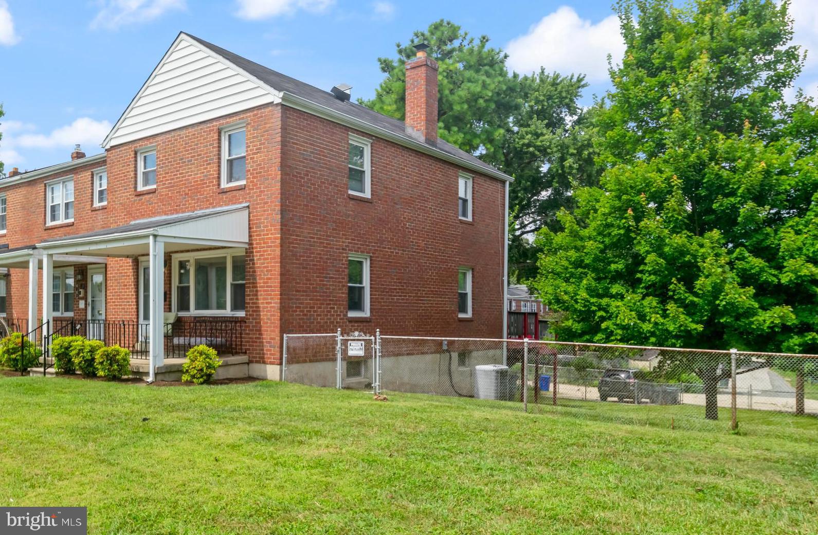 3 BD, 2 Ba Updated End of group townhouse in Towson with pleasant front porch and huge fenced backyard. Spacious parking pad for easy parking. Freshly painted throughout just move in and enjoy!! Wood floors on Upper and Main level in LR & DR. Updated baths. White kitchen with refrigerator, gas stove, dishwasher and plenty of cabinet and counter space. Rooms are spacious and bright! Lower level has a large finished family room, a large utility area with washer, dryer and lots of storage space. Complete full bath w/shower. Sizeable deck off dining room with sliders for easy access. Walking distance to the grocery store, bank and many other amenities. Close to main thoroughfares, shopping and whatever your heart desires!! You'll appreciate the room this home has to offer and the park like yard. Shed will convey with property "as is".