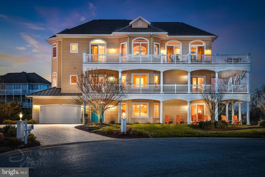 Luxurious 5BR/5 BA home in the prestigious neighborhood of  Martha's Landing in desirable West Ocean City hits the market.  This home has views of the Bay, the inlet and the Boardwalk, and has an elevator and a two car garage!  As you walk into the home you see the fabulous decor, attention to detail and exceptional craftsmanship with custom finishes throughout. This is the perfect floor plan for large families and for entertaining  guests.  On the first floor there is a large great room with wonderful kitchen and a spacious bedroom and full bath.  On the second level you will find a spacious oversize master bedroom with his and her closets, a fireplace and a glass slider leading to a beautiful wrap around deck.  There are also two addition bedrooms each with a full bath.  On the third level you will find yet another large bedroom and bath.  The professional chefs kitchen is sure to please the cook in your family.  There is plenty of storage and a large center island complete with granite countertops. The large dining area is off the kitchen and is perfect for enjoying dinner with family and friends. The large great room extends to the deck where you will enjoy endless sunsets and views of the inlet, the Bay and the boardwalk.  The house also has a two car garage, a fire sprinkler system, wrap around decks, a paver driveway and an elevator.  This home was constructed by Piney Island Builders.  (HOA - pays for grass cutting and use of pool at Sunset) Come take a look at this incredible home today and make it yours!