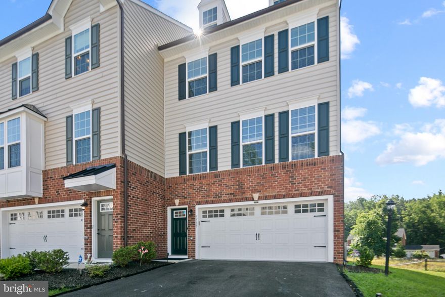 Like new End-Unit Townhome with 2 car garage! Spacious and open main level with gourmet kitchen and breakfast bar, dining area and rear deck overlooking green space. Upper level features 3 bedrooms including a primary suite with walk-in closet and bedroom level laundry. Finished lower level provides additional family room and entertaining space.