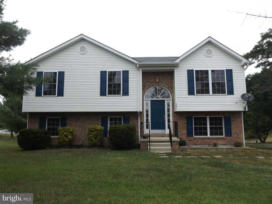 Convenient to shopping, restaurants and schools. This 3 bedroom, 2 bath split foyer has new paint and new carpet. Enjoy the convenience of commuting while living out in the country.