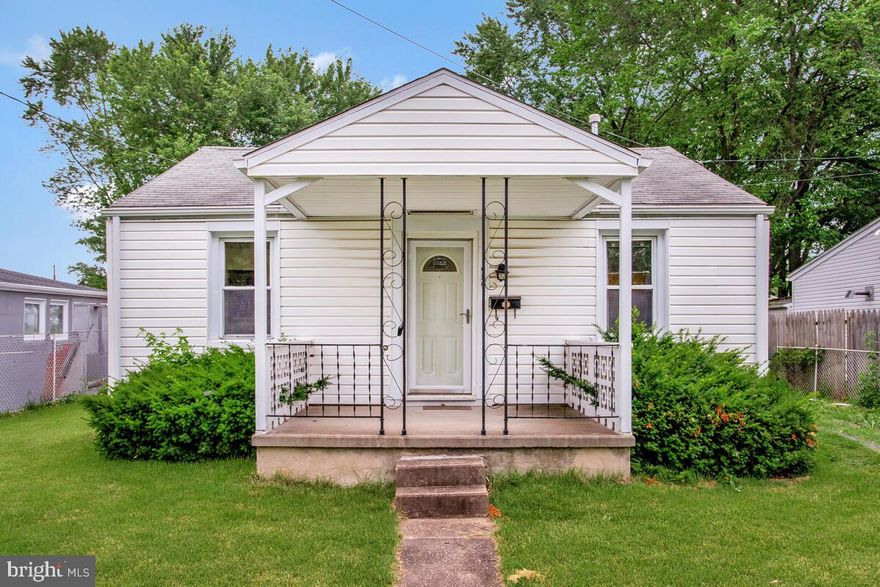 Welcome to this charming 2-bedroom, 1-bath home offering comfort, convenience, and outdoor appeal. Relax on the inviting front porch or enjoy the spacious living room and generously sized bedrooms, ideal for everyday living. Durable vinyl flooring adds modern style and easy maintenance throughout. The fully fenced yard provides privacy and space for pets, gardening, or entertaining. A detached 2-car garage plus a driveway with room for two additional vehicles ensures ample parking. Located near the beautiful Back River, Cox Point Fishing Pier, and Rocky Point Park, this home is perfect for those who appreciate nature, recreation, and a quiet neighborhood setting. Don’t miss the opportunity to make this well-maintained home your own!