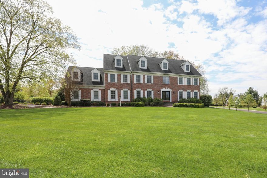 Wonderful opportunity to move into sought after Hidden Lake Estates in Newtown, PA. This 5 bedroom, 5 full and 3 half bath brick colonial features a grand two story foyer entrance with turned staircase, hardwood flooring and crown molding. A large living room & dining room with hardwood floors flank the main entrance. Perhaps the most enjoyed areas of any home are the kitchen and great room. Without exception, 4 Bayshore Drive offers plenty of memorable moments. The gourmet kitchen features center island with granite countertops and adjoining breakfast area. This all opens to the great room with gas fireplace and wet bar which is great for entertaining! You can work from home in the 1st floor study with french doors and another door leading to a private deck. Two powder rooms and large laundry room complete the first level. Upstairs is the primary bedroom suite with custom bathroom, sitting room with private deck & large walk-in closets. Bedrooms 2, 3 & 4 are located on the second level and are all have their own full bathrooms with the additional 5th bedroom with full bathroom occupying the entire third floor. Below is the finished basement with built-in bar for entertainment, exercise room, game room, media area and another powder room. Outside is paradise! Beautiful inground pool, patio, oversized deck and two private decks offer tranquil views over an acre of fenced-in property all while you enjoy your morning cup of coffee! Other highlights include an oversize 3 car garage and one of the most convenient locations in Newtown. You are just 5 minutes to schools, grocery shopping, restaurants, Tyler State Park and historic Newtown Borough! Easy access to I95, all points in NJ including the Princeton Route 1 corridor, train stations and airports. Award winning Council Rock School District. Don't miss out on this incredible property. Add your own touches and updating. It's just what you have been waiting for!