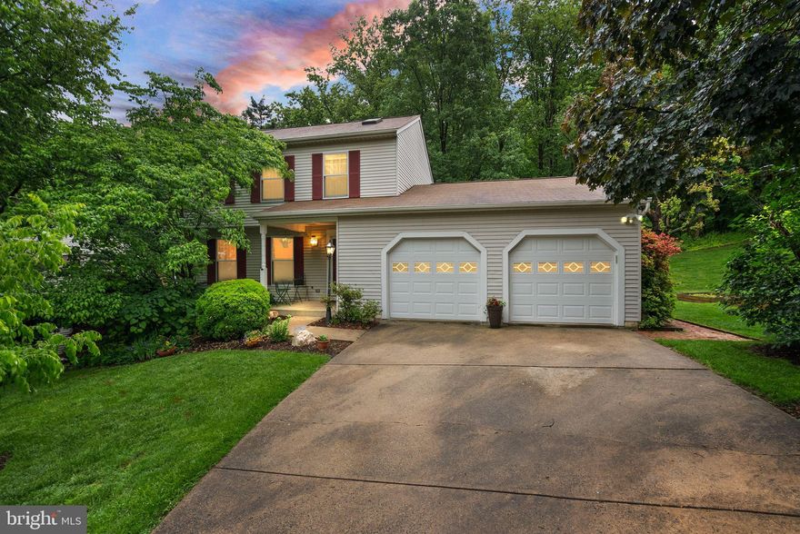 **$50,000.00 Price Reduction!! VERY MOTIVATED SELLERS!!** Welcome to this beautifully maintained and thoughtfully upgraded home, offering the perfect blend of modern updates and timeless charm. Nestled in a peaceful setting that backs to a protected five-acre wooded area, this home provides stunning, uninterrupted views and a serene outdoor retreat.  

Since 1998, this home has been carefully enhanced with high-quality improvements, including a brand-new Trex deck (2023), a full HVAC system with a new heat pump (2023), and gleaming wood floors throughout the main level. The updated kitchen (2022) boasts stylish new cabinets and a stone backsplash, while the living room features a cozy new gas fireplace with a custom built-in. Additional upgrades include recessed lighting throughout, a vented skylight in the upstairs bath, a Solatube in the hallway for added natural light, and a whole-house fan for enhanced ventilation.  

The lower level has been thoughtfully expanded to include a full bathroom and newly added French doors leading to a walk-out patio, creating a flexible and inviting space. Pella replacement windows, an Andersen 6-foot sliding glass door in the family room, and new garage doors (2013) further enhance energy efficiency and aesthetic appeal. Major structural updates include a new attic fan (2019) and a roof replacement (2011), ensuring peace of mind for years to come.  

This home offers unmatched convenience, located just 1.8 miles from Huntington Metro, providing easy access to the city. The nearby I-495 Beltway connects to Maryland and Northern Virginia, while Washington, D.C., the Pentagon, Fort Belvoir, and other key locations are all within a short drive. Outdoor enthusiasts will appreciate proximity to Huntley Meadows, a nationally recognized wildlife preserve, as well as Franconia Park with its recreation center, pools, and sports fields. The Potomac River, featuring boating, biking, and walking paths, is also close by.  

For those who love history and culture, Old Town Alexandria is only three miles away, offering charming shops, dining, and waterfront views. George Washington’s historic Mount Vernon estate is just an eight-mile drive, providing a glimpse into the region’s rich past.  

With a prime location, numerous high-end upgrades, and a tranquil wooded backdrop, this home presents a rare opportunity to enjoy both modern comfort and natural beauty. Schedule your tour today!