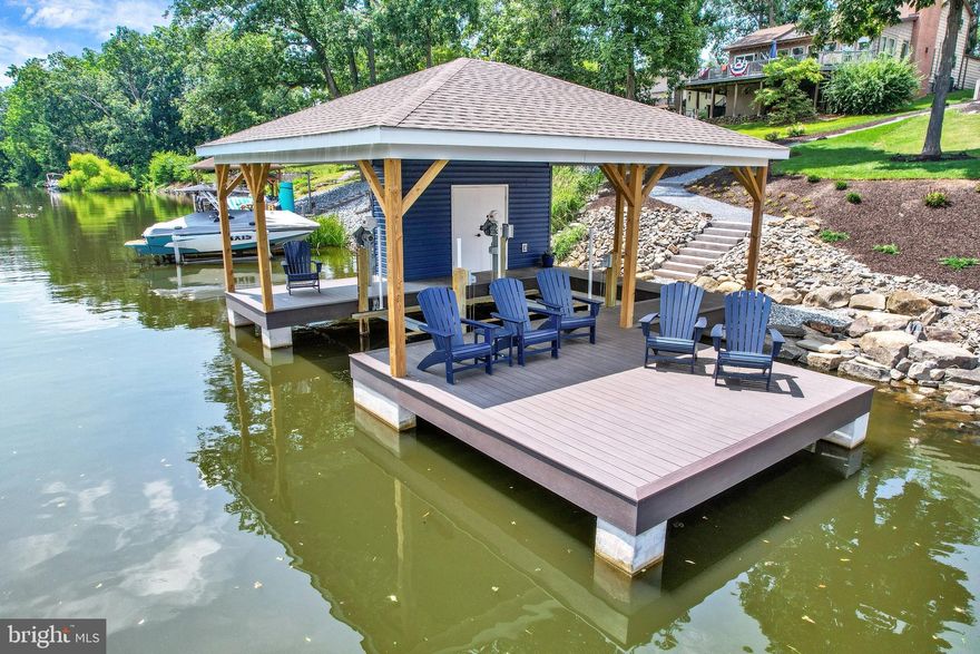 Your Exclusive Waterfront Sanctuary awaits...
Highly sought after location in a gated community on a peaceful waterfront cove with AMAZING
views.
This turn-key home is meticulously maintained, including high end, quality finishes and tasteful
renovations. Upon entering the home, it is apparent that every inch has been thoughtfully
crafted to provide the highest level of comfort, style and storage for on the lake living.
The main floor primary suite provides one floor living, custom bathroom and custom closet. The
expansive living area features water views out of every window and a floor to ceiling stone
fireplace. This provides the perfect space to entertain, relax or connect with the splendor of
your surroundings. The waterfront views face south providing beautiful sunrises and a naturally
shaded teak deck in the afternoon.
Professional landscaping and brand new, custom covered boat dock truly make this masterfully
constructed home one that you will not want to miss!
Schedule your exclusive tour today!