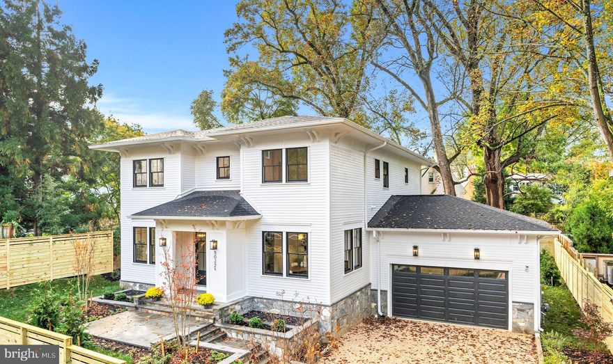 NEW PRICE! GREAT VALUE!  NEW CONSTRUCTION nestled among mature trees and set privately off the street, this home is the ultimate in sophisticated city living. Located in  sought after Kent, it boasts a bright open four square floor plan w/10ft ceilings on main level, elegant living and dining rooms.  A chef inspired kitchen with luxury appliances.  The butlers pantry has an additional dishwasher.  A large waterfall kitchen island opens to a light-filled family room with gas fireplace. In addition, the mudroom consists of a work space, pantry closet, coat closet and cubbies.  French doors span the rear of the home with easy access to the expansive outdoor patio and large backyard.  The second level includes a primary suite with large shower, free standing soaking tub and walk-in closet, three additional bedrooms and a dedicated laundry room. The fully finished lower level offers a light filled expansive recreation space, 9ft ceilings, 2 bedrooms and bathroom, wet-bar with beverage fridge and access to the backyard. The large outdoor patio offers a perfect space for entertaining and relaxation.  Attached TWO car garage with plug ready car charging.  Storage space galore. On a quarter of an acre (10,455 sq ft). Mins to Georgetown, VA & MD.  Walk to restaurants stores etc.