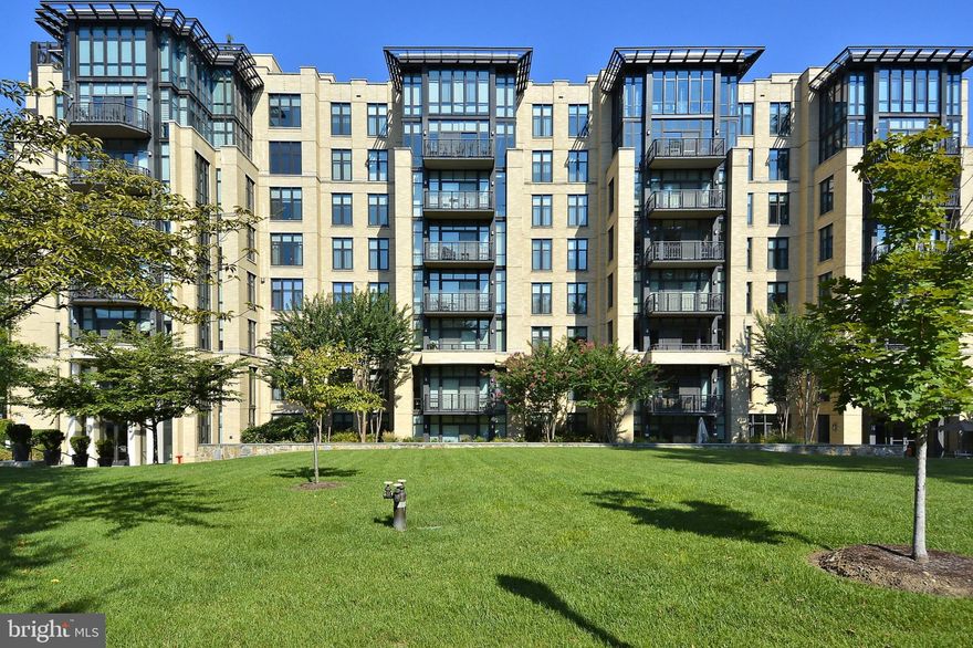Stunning 2 level Penthouse condo with dramatic views! Grand 2 story entry foyer with a skylight, gourmet kitchen w/all Viking appliances, a wine fridge, and sleek wood cabinetry. 2 Bedrooms plus a den/library, 2 Full Baths, and a second level loft area with glass doors opening to a private terrace. Brazilian cherry floors throughout. Two garage spaces and a storage room also convey. Spectacular views of green space! Outside the lobby front door is downtown Chevy Chase, Whole Foods, shopping, restaurants and Friendship Heights Red Line metro. The building offers on-site property management, 24 hour concierge, fitness center, club room with a catering kitchen and an outdoor terrace for private parties.