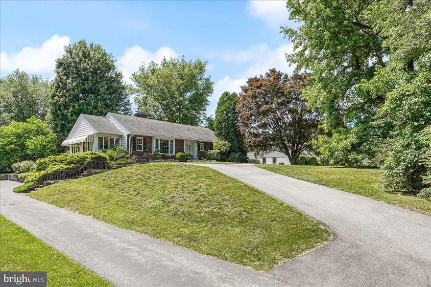 Experience the Best of primarily single-floor Living in this inviting home. Step into warmth and comfort with this beautifully maintained home, offering an open and inviting floor plan. The spacious living room, complete with a cozy gas fireplace, seamlessly flows into a bright Florida Sun Room—perfect for relaxation. Enjoy meals in the dining room with scenic views of the rear yard or in the updated kitchen, featuring a breakfast bar, bamboo wood flooring, newer appliances, and ample storage. Hardwood flooring runs throughout the main floor, adding timeless charm.

This home boasts three generously sized bedrooms and two full bathrooms. The remodeled primary bath is a luxurious retreat, featuring earth-tone stone tiles and an oversized shower. A floored attic provides additional storage space.

Step outside to appreciate the mature landscaping, beautiful trees, and a stunning covered flagstone patio overlooking the rear yard and gazebo—ideal for outdoor entertaining. Recent updates include a separate driveway with direct main-floor access and a convenient rear yard walkway. The low-maintenance exterior features a classic brick front and durable vinyl-covered aluminum siding.

The fully finished basement is a standout, offering a carpeted family room with a gas fireplace, a bar area, a workout room, a powder room, and a tiled utility space. A whole-house air filtration system ensures comfort year-round.

Lovingly cared for, this home radiates pride of ownership. Conveniently located near major routes, golf courses, shopping, and within the highly sought-after Radnor School District, this home is a rare find.

Don’t miss the opportunity to make it yours!