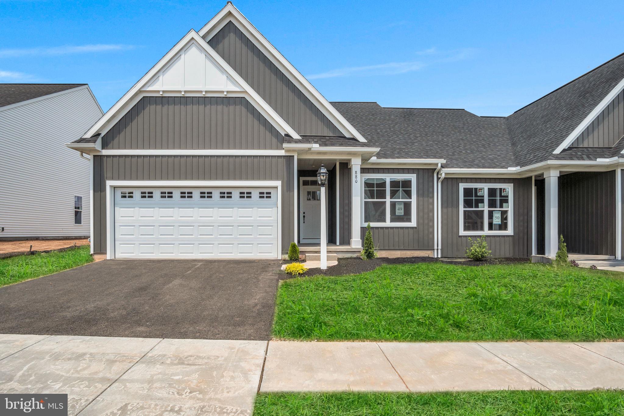 This charming home by Garman Builders offers an ideal combination of space and style. The Griffin model features 2 spacious bedrooms and 2 full baths with 1,530 sq. ft. of well-designed living space. Inside, you'll be greeted by a stunning vaulted ceiling that adds a sense of openness and elegance. Step outside to a private concrete patio—perfect for enjoying outdoor moments. With thoughtful upgrades throughout, this home offers both comfort and convenience. Located in York County's premier 55+ community, it's the perfect place to enjoy a vibrant, peaceful lifestyle. Come see why this could be your perfect new home! This home is set to be completed 6/16/2025. Photos are of a previously built home, just reference.