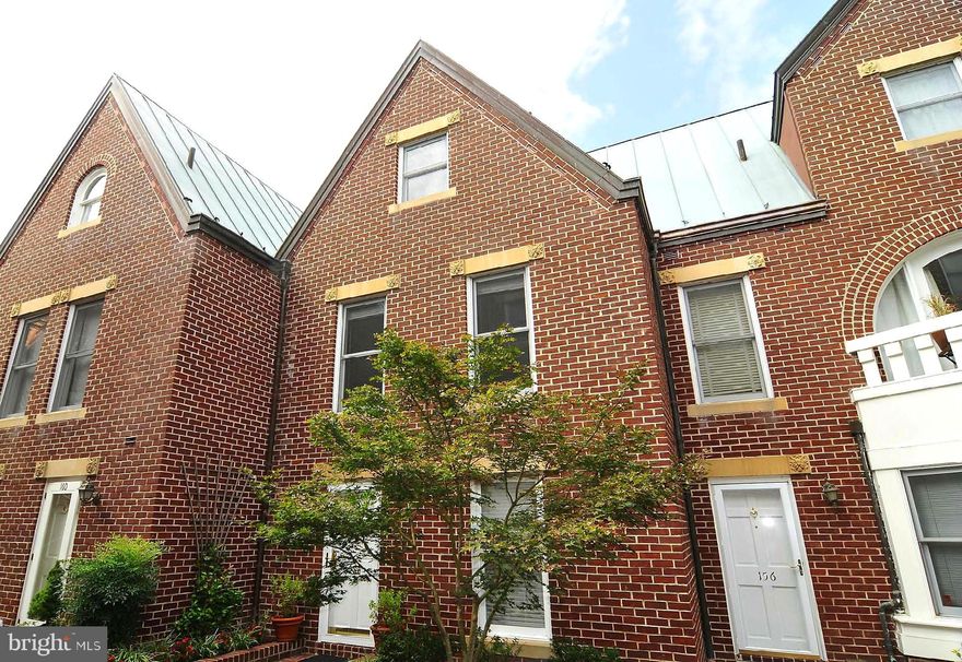 Rarley available Torpedo Factory city townhome in the heart of Old Town Alexandria just 1 block off the riverfront & King Street shops and restaurants.  Prime location, quiet upper level terrace location, with city views to the North and top floor peeks of the river to the East.  This three level townhome features a main level open floor plan, with hardwood floors, a seperate dining room, pass thru opening in the kitchen and soaring two story ceilings in the living room.  The main floor features the kitchen with granite counters and stainless appliances, spacious dining room and living room with large windows and a stacked stone fireplace feature wall.  The upper level has a loft style sitting area open to the living room below, perfect for a reading area or home office nook.  The first of two primary suites is located on this level.  The top level features the second suite, a perfect seperation of space for two primary bedroom suites with private baths.  Laundry is located on the bedroom level.  
A Garage parking space in the Torpedo Factory building is included in the rent. Secure parking garage Colonial Parking Garage-Entrance on Union St and another entrance on Lee St (PS#72).  Both Braddock Street Metro and King Street Metro are within easy walking distance- 1.2 Miles, or use the King Street Trolley for easy transportation.  A quick commute to Washington, DC, nearby Reagan National Airport and Amazon HQ. Walk out your front door and you are within 1 block to lower King street amenities, directly across the street from the Torpedo Factory Art Center and Old Towns vibrant waterfront.  Two entry points for access, secure lobby entrance on 102  N Union Street or walkup terrace level on the 100 block of N Lee St.  Simply can't beat the location.
Condo Association rules state No Pets >30 LBS.
Owner prefers a 2-3 year lease but will consider a one year lease.