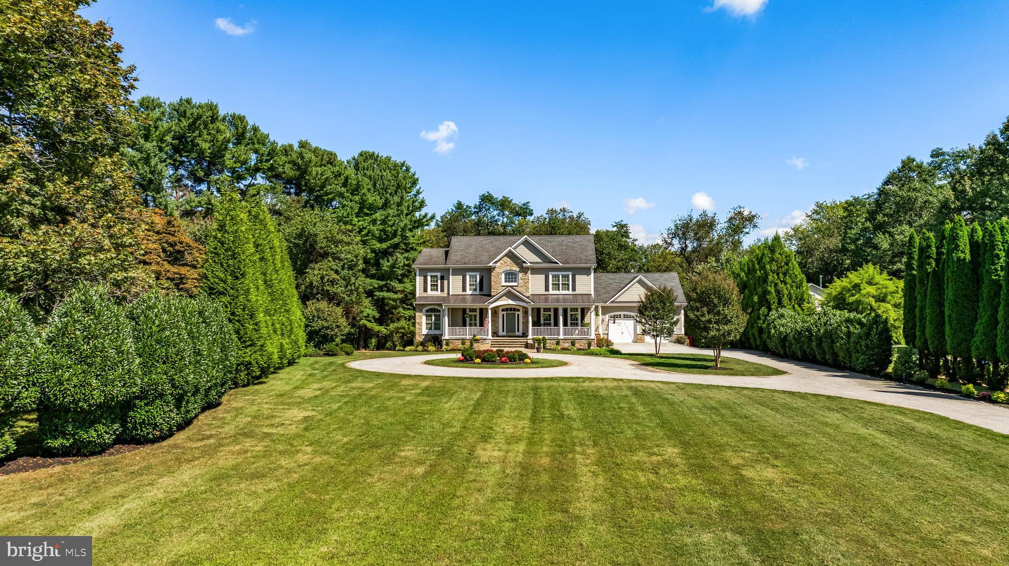 Welcome to 12519 Falls Road, an exceptional luxury estate nestled in the prestigious Falls Road corridor of Baltimore County. Located just minutes from Ruxton, Pikesville, and Towson, this meticulously maintained residence offers the perfect blend of sophisticated design, modern amenities, and timeless elegance—all set on a private, tree-lined lot in one of Maryland’s most sought-after locations.
This stately custom home offers over 7,000 square feet of refined living space, set on a private and beautifully landscaped lot surrounded by mature trees, rolling hills, and prestigious neighboring estates. The home features a grand two-story foyer, formal living and dining rooms, and a private home office. The gourmet kitchen includes high-end appliances, an oversized island, custom cabinetry, and opens to a spacious family room with fireplace—ideal for entertaining or everyday comfort.
Upstairs, the primary suite is a true retreat, boasting dual walk-in closets and a spa-like bath with marble floors throughout and a soaking tub and walk-in shower. Additional highlights include a cozy reading nook, large secondary bedrooms, finished basement built for entertaining with the potential for another bedroom.
Enjoy resort-style outdoor living with a covered patio, manicured grounds, and ample space to add a pool or outdoor kitchen. A 2+ car garage, circular drive, and abundant storage complete the home. DECK will be completed by end of October or sooner.
Located just minutes from Greenspring Station, top private schools (Maryvale, McDonogh, St. Paul’s, Garrison Forest), Wegmans, Hunt Valley Shops and convenient access to 83, I-695 and downtown Baltimore. A rare find combining luxury, location, and lifestyle.