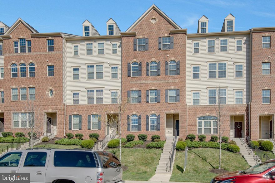 Elegant Ryan Homes Picasso model luxury townhome in sought-after Virginia Manor Community! Three spacious bedrooms and 2.5 luxury bathrooms located in Lightridge High School district! The main level, with high ceilings and lots of natural light, offers upgraded hardwood floors throughout starting at the foyer. An amazing gourmet kitchen with granite countertops, an oversized island, stainless steel appliances, double wall ovens, a gas cooktop, and a breakfast room is made for entertaining with its open floor plan. Also on the main level is a spacious living/dining area with a powder room and access to the oversized garage. The upper level boasts a large primary bedroom suite that offers a sitting area, 2 walk-in closets, a tray ceiling, an updated bathroom with an oversized shower, dual vanities with granite counters, and a linen closet. There are two large bedrooms on the upper level with ample storage, a full hall bathroom with double sinks, and a granite countertop. All the bedrooms enjoy lots of natural light and ceiling fans, and the upper-level walk-in laundry room provides convenience and extra space. The attached oversized rear garage provides parking for one car plus room for storage.  An additional car can park on the attached driveway. The community has ample parking for guests throughout. The Virginia Manor Condominium is a sub-division of the Dulles Farms Community and offers residents outdoor pools, a clubhouse with a fitness center, tot-lots/ playgrounds, tennis courts, jog/walk paths, a picnic area, and nature trails. ****Monthly condo fee includes water & sewage fees. ****It is close to many shopping & dining options, Dulles Airport, and major commuter routes such as Route 50, Route 28, and 286.