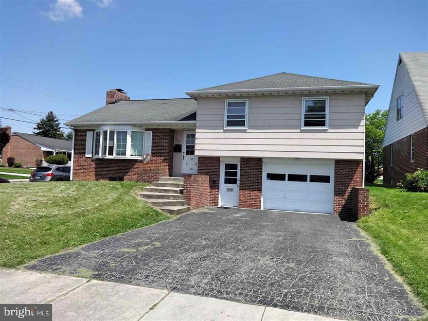 Fantastic 3 Bedroom 2 Bathroom home located on a corner lot in a well established neighborhood. This home is well built with Hardwood floors throughout. Relax in the large living room of sit by the fire in the lower level family room. Outside sit on the front or back porches and enjoy the weather!