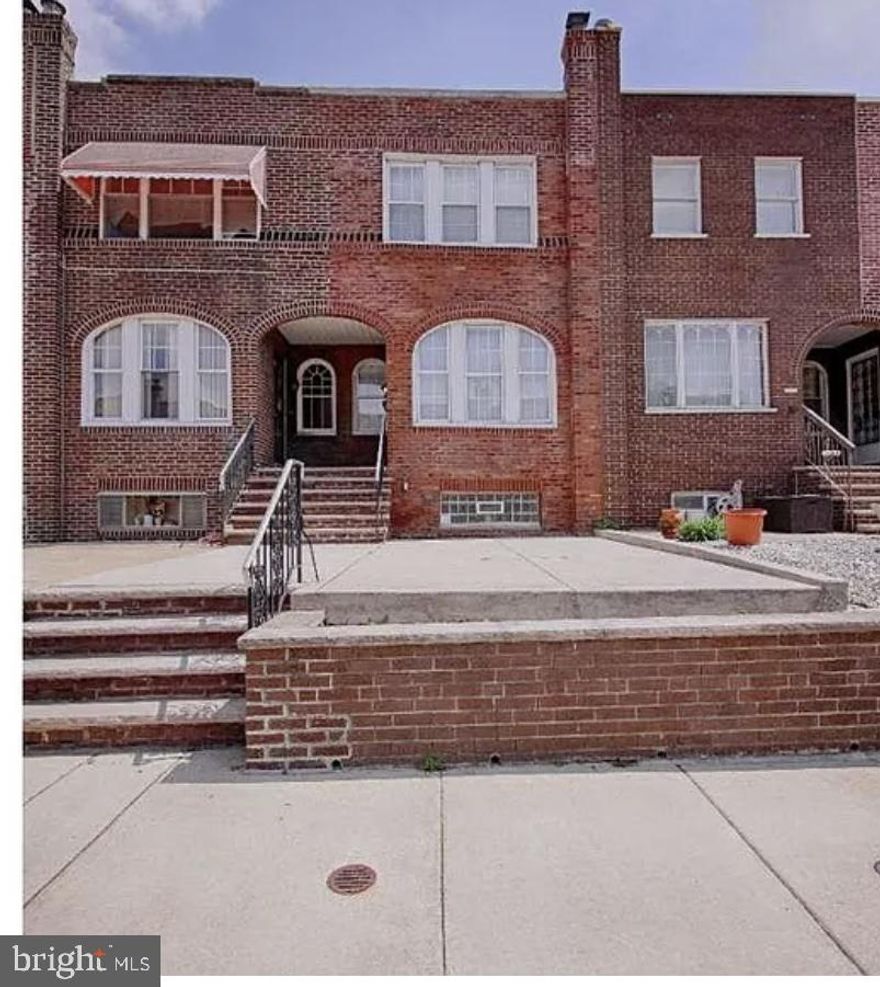Truly one of the best that South Philadelphia's Stadium District has to offer in the Marconi Park section off Broad offering a tremendous walking score! Nothing is left for you to do here, but move in and enjoy all the improvements already made! The main level welcomes you with a naturally bright living room with high-hat lighting, chair rail, and beautifully refinished parquet style hardwoods with inlay that continue into the dining room. The dining space is generous with fantastic detail work with chair rail and picture boxes and offers outside access to the rear deck. The kitchen has been remodeled allowing for great counter and cabinet space and boasts stainless steel appliances and granite counters. The basement is a must see with the floor dug up, original sewer line replaced, and floor lowered to allow for more headroom and better entertainment space. It is complete with a bar, gas fireplace, bathroom with shower stall, laundry/mechanical space, storage closets, and rear alley access. The upper level features a beautifully remodeled and expanded hall bath with both a shower stall and jetted tub, a master bedroom with 2 closets, and completed with 2 additional bedrooms. Package all of this up with these additional amenities and you have a must see home with both front and rear entertainment space in a large front patio and maintenance free rear deck, best of both worlds with hot water heat and central air, replacement windows, 2 panel doors, Marconi Park at the top of the street and just through the park is are Septa stops for the bus and subway into Center City, mere short walk to the Stadiums, 95, Chickies, Xfinity, The Lakes/FDR Park, and a short commute to Passyunk Ave, Center City, bridges to NJ, and so much more! Make your appointment today!