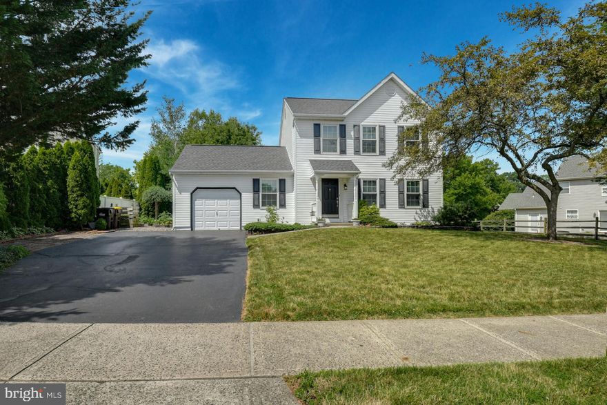 This is the home you have been searching for!  A charming colonial home that has been meticulously maintained and upgraded for comfortable living in a beautiful setting in the Award-winning Central Bucks School District. The home is complemented by neutral colors, crown molding, and lots of natural light.  Hardwood floors invite you to a wonderful great room plan with an adjoining dining room creating an inviting space for relaxing or entertaining.  Cooking will be a joy in the updated kitchen featuring raised panel, wooden cabinets, granite countertops, and a tile backsplash.  Glass doors open to a lovely patio, an ideal space to enjoy a meal under the lighted pergola and take in the beautiful gardens with a meandering pathway, abundant plantings, and a wonderful firepit area.   A main floor mud room, pantry, powder room, and attached garage add the comforts of home.  The primary bedroom features a cathedral ceiling, three closets, and a stunning, remodeled bathroom with a large, tile shower.  There are two additional bedrooms and a hall bath.  The lower level has been partially finished adding great space!  The roof was replaced in 2014 followed by new heat and air conditioning in 2016. And the location can’t be beat!  Plumstead Township is a hidden gem in Bucks County. The quaint and historic towns of New Hope and Doylestown are a stone’s throw away with wonderful restaurants and entertainment venues.  All of this while being a comfortable distance to Philadelphia, Princeton, and New York.