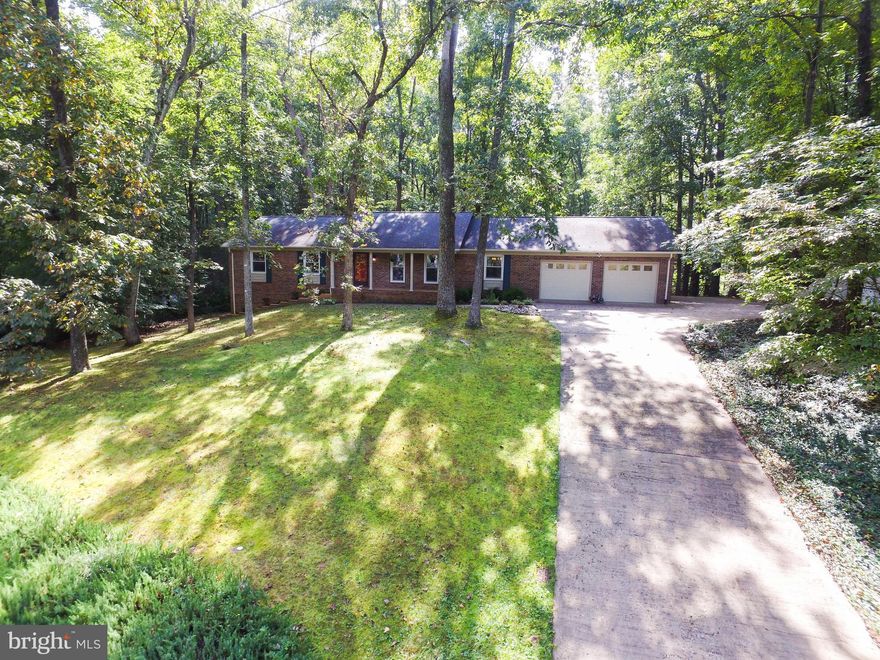 PRICE IMPROVEMENT -K MOTIVATED SELLER BRING ALL OFFERS Beautiful open concept on Ni River! 4 bdrm 3 bath. Master on main. possible 5th (NTC) on lower level. Amazing wet bar and rec room. Enjoy lounging in your sun room or on the large back deck! Upgrades throughout including Granite counters, new appliances, new carpet and drywall. 2 car garage fully renovated as well! Newer shed in backyard