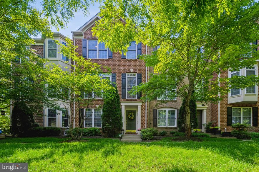 Well appointed and impeccably maintained home located in a park-like setting with mature landscaping & attractive common areas. Offering 2 car rear entry garage leading into a versatile space that could be a comfortable home office or recreation room with half bath.  Next level features a newly renovated  kitchen with timeless elegance including white cabinetry, upscale stainless steel appliances, double oven, 5 burner gas cooktop in oversized kitchen island with exquisitely beautiful granite counters. Modern faucet, undermount sink,  attractive backsplash, recess lighting and custom fixtures.  Enjoy 9ft ceilings, crown and chair rail moulding, gas fireplace, stunning floor to ceiling windows, hardwood floors 2nd and 3 level.  Gorgeous new trex deck providing relaxing outdoor retreat for entertaining.  Luxurious master suite offering tray ceilings, walk-in closet, bathroom with dual sink and soaking tub. Home includes a sophisticated surround sound intercom system, doorbell security. Location provides convenient access to major routes making it a commuters dream! Experience the charm of historic downtown Annapolis, with excellent shopping, waterfront dining and entertainment.