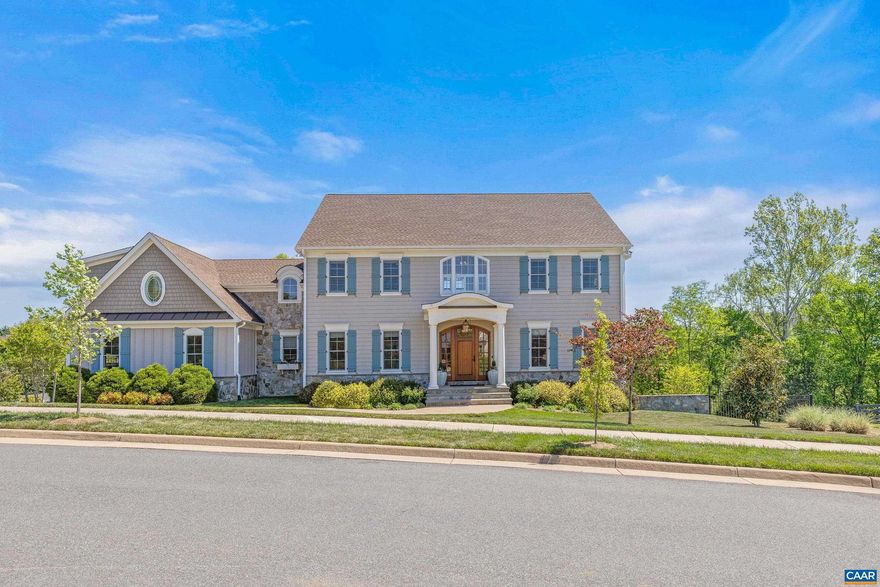 Immaculate Custom Home in the Creekside section of Old Trail?set on almost half an acre with mountain views from the front AND peaceful pond and garden views from the screened back porch. Over 4,400 sq ft of like-new finished living space plus nearly 2,000 sq ft of unfinished walk-out basement?an ideal blank canvas for a gym, media room, or future expansion! This 5-bedroom, 5.5-bath residence is appointed with elegant finishes throughout: coffered ceilings in the great room, built-in cabinetry, intricate crown moulding and decorative wall panels. The light-filled kitchen features stainless appliances, a large pantry with abundant storage and an extra refrigerator. A main-level dedicated home office adds convenience for remote work. Two bedrooms offer private ensuite baths; the primary suite includes a sitting area, mountain views, and a luxurious bath with a claw-foot tub and spacious walk-in shower. Thoughtful indoor-outdoor living amenities include a pass-through gas fireplace between the great room and the Trex grilling/sitting deck, a screened porch overlooking the garden and pond, newly landscaped stairs, and a fenced backyard for privacy and play. A rare blend of refined detail and practical space!,Granite Counter,White Cabinets,Fireplace in Family Room