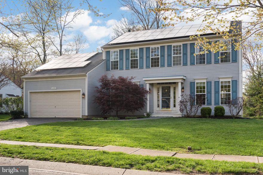 Blackwalnut Cove colonial with 4BR and 3.5 baths backs to green space and park.  Distinctive features include expansive living spaces, eat-in kitchen opening to deck and large rear yard, master suite with vaulted ceilings, spacious en-suite and walk-in closet, finished lower level with rec room and fifth bedroom, two-car garage.