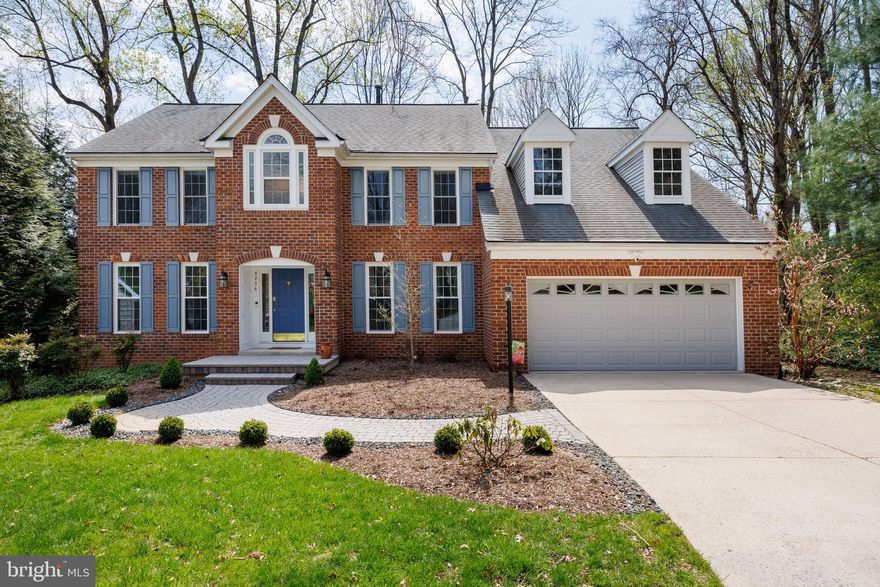 Welcome to this beautifully maintained Colonial-style home, nestled on a peaceful cul-de-sac in the highly sought-after River Hill community. This 4 bed, 4.5 bath residence offers timeless charm, quality craftsmanship, and a warm, inviting atmosphere throughout. Inside, you’ll find hardwood floors, sunlit living spaces, and a thoughtfully designed layout. The kitchen features classic wood cabinetry, granite countertops, a double wall oven, center island, and a Butler’s pantry with prep sink. The breakfast room opens directly to an expansive deck, perfect for entertaining or relaxing while enjoying the beautifully landscaped backyard that backs to serene parkland. The stunning two-story family room is filled with natural light from skylights and features a cozy wood-burning fireplace. Upstairs, the primary suite is a true retreat with cathedral ceilings, skylights, a walk-in closet, wet bar, and a spacious en suite bath complete with a soaking tub and glass-enclosed shower. Three additional bedrooms include both a Jack-and-Jill and a private full bath. The finished walk-out lower level includes a game room, media room, bonus room, full bath, and ample storage, along with access to a charming brick patio. The two-car garage is electric-vehicle charger ready, offering both convenience and future-ready functionality. Enjoy access to River Hill’s community amenities, including a pool, walking trails, and parks, all within close proximity to upscale dining and entertainment in Columbia, Ellicott City, and Clarksville. Schedule your showing today!