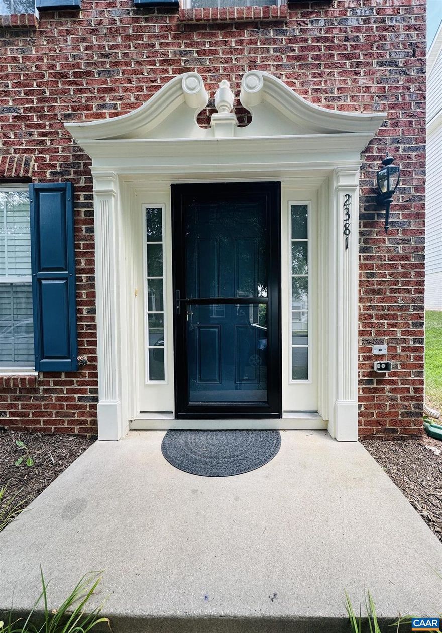 Impeccably maintained + improved, this SPACIOUS 4br/3.5ba townhome offers the best of low-maintenance living! Stately brick END UNIT features a premium 3-story bump-out addition plus 2-CAR GARAGE on a quiet street steps from common space + convenient to everything Cville. The open floor plan features gorgeous HARDWOOD floors on 2 levels, high ceilings throughout, abundant NATURAL LIGHT streaming through many windows + POWDER ROOM on main living level. Gourmet OPEN KITCHEN provides perfect space to cook & gather with island, ample granite counters, stainless appliances, breakfast nook + easy access from the rear garage for groceries. Cozy up w/ a beverage in the sunroom or on the spacious trex deck. Upstairs, MASTER SUITE w/ vaulted ceiling, walk-in closet & large en suite bathroom plus 2 more bedrooms & hall bath. First floor provides additional fourth bedroom, full bath, family room + nook perfect for an office or gym. Incredible PROXIMITY to so many things - walk to Hollymead shopping/Target, 5 mins to CHO airport, 15 mins to UVA/Downtown.