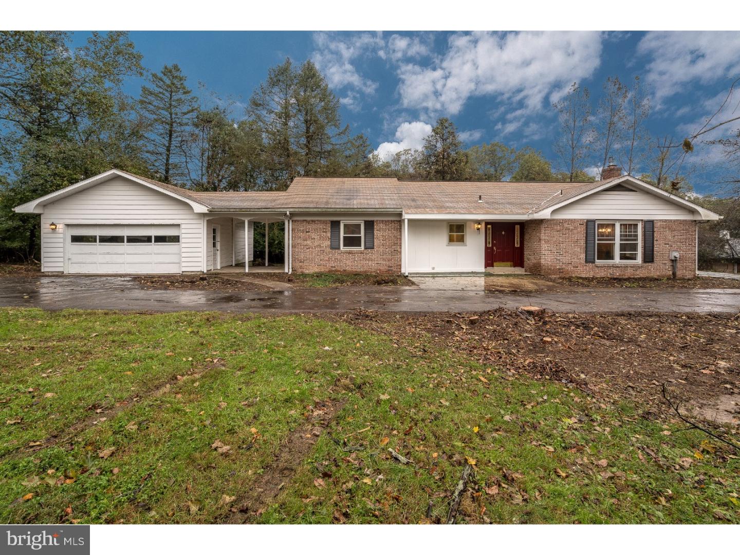 This 1-story brick single in Wilson Schools consists of 4 bedrooms, 1 bath, hardwood floors and updated bathroom, gazebo, barn with 5 horse stalls and tack room, pasture, garage with breezeway area, private parking on the circular driveway, and over 9 acres, some pasture and woodland.  The foyer has stone/slate floor. Most of the flooring is hardwood and NO carpeting. Bathroom has newer double-bowl sink and vanity, tile floor, linen closet, tub/shower, and toilet. The home is heated with propane with hot air heat and central air. Brand new HVAC, hot water heater, and well pump!  Quiet setting with acreage.  The property can use some TLC and cosmetics to suit your taste. Great potential with this property in the Wilson School District. This listing includes 3 parcels: 80-4385-06-38-0556 as 2.95 acres includes the house, garage & barn;  80-4385-06-28-8948 is 6.25 acres; 80-4385-06-38-3782 is .21 acre.