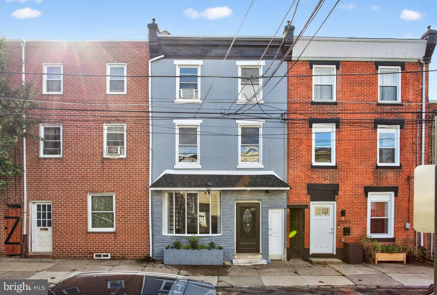 This is a beautifully remodeled home in the heart of Fishtown.  The property is a four bedroom with two full bathrooms, with another extra room on the first floor. This is a true unicorn property; spacious, clean and on the top of everything: an indoor garage in the back of the home.
The living and dining room are combined with elegant lines and a lot of natural light, with high quality flooring throughout. The first floor continues with a very spacious kitchen, equipped with a set of modern appliances. There is an extra room on the first floor in the extension of the kitchen space. A very spacious, full bathroom is accessible from this area, and the space is concluded with  a laundry room.  From a laundry room, you can access the garage in the back of the first floor. 
Two bedrooms are located on the second floor and with a newly remodeled full bathroom with a standing shower. The rooms have plenty of closet space.  The third floor is set with two large bedrooms full of light, with clean and high quality laminate flooring, and plenty of closet space.  The basement is smaller in area, however, it can be a very functional space with a lot of potential as a storage or a game room.
This home is an incredible value, very spacious and it offers great features. In addition, the home is equipped with a time tested and proven circular flow radiator heating system and it works wonderfully with an added multi split system of heating and cooling. The property has a sum pump that will prevent the property from any water intrusion and damage. This is a real deal. The virtual staging photos indicate the potential of this incredible home in the heart of Fishtown.