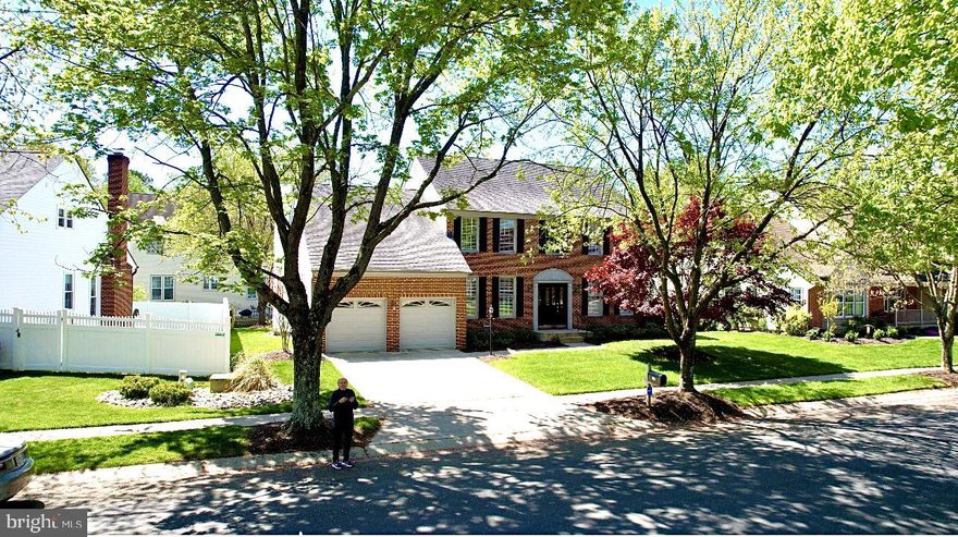 Magnificent center hall colonial inside the Crofton Triangle, ideally located a very short distance to both Crofton Middle School and Crofton High School. Beautifully built and meticulously cared for, featuring nine-foot ceilings, enormous windows, classic floorplan, muted colors, brick front, fenced rear yard and much more. Recent updates include a new Trex deck (2024), hardwood flooring (2017), brand new house exterior siding and gas fireplace (2023), LG washer/dryer (2020), upper-level carpeting replaced in 2021, Whirlpool refrigerator/freezer (2024), and one-month-old 50-gallon gas hot water heater. Full dry, insulated basement with rough-in, and a finished room that could serve as a fifth bedroom. Did we mention it's prime location within walking distance to Crofton Swim & Tennis Club? Reach out to your realtor, engage your lender, and share with your loved ones. We eagerly anticipate welcoming you!