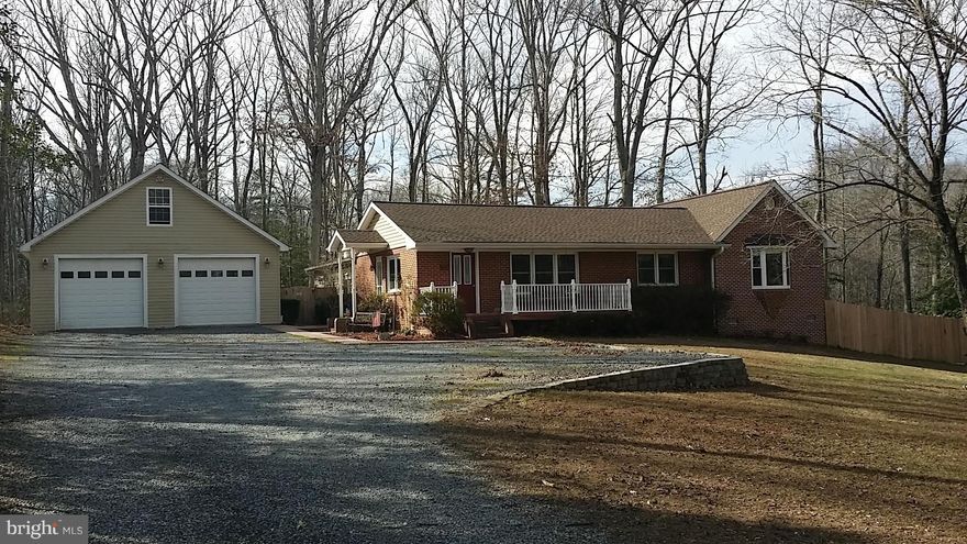 JUST REDUCED! Charming 2,900 total sq ft, 5 bed/3 bath home w/separate office is situated on a beautiful lot full of mature trees. This home boasts a very large master bedroom & bathroom w/ open concept kitchen&living room. Finished basement with 1 bedroom, bathroom, wet bar, & additional family room w/ a walkout to the backyard. Close to Indian Head, Dahlgren, DC, schools, shopping & restaurants.