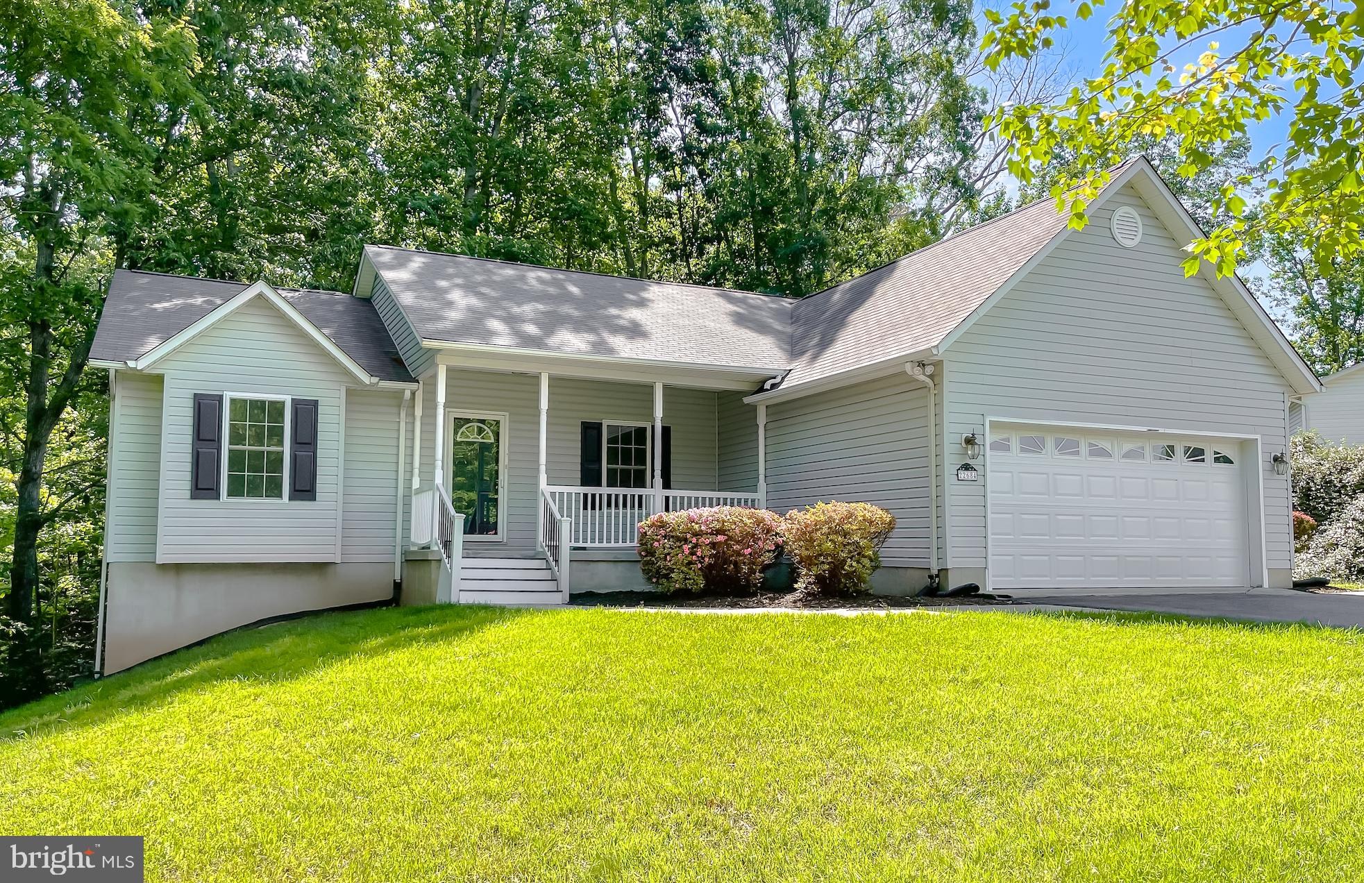 Welcome to Rue Woods where you will enjoy the ease and convenience of one level living and also a full finished basement totaling over 3000sqft of living space! This 4 bedroom, 3 full bath home sits on a nearly a half acre and backs to trees for added privacy. The entire home has all fresh paint, new carpet and stainless appliances. The main level has a nice open area concept kitchen/dining area/family room with cathedral ceiling. Three bedrooms, two full baths and laundry/mud room are located on the main level. Spacious primary bedroom with en-suite bath has a soaking tub and separate shower. On the lower level you will find the fourth bedroom, another full bath and huge rec area to enjoy as you wish. Home backs to Forest Retention so law yard maintenance and no new construction behind you! Centrally located near shopping and restaurants and easy commute to Pax River NAS.