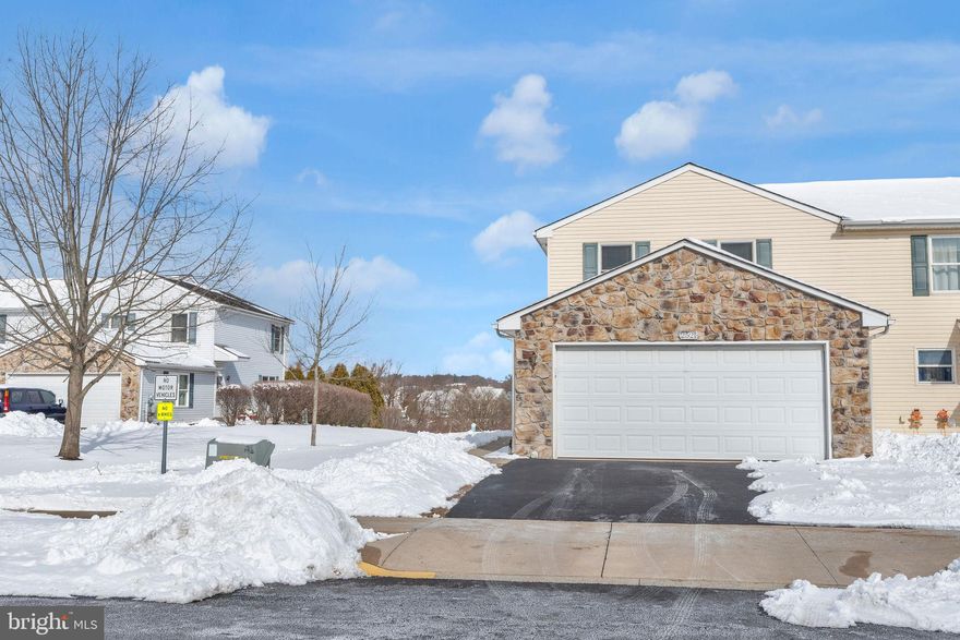 Welcome home to this beautifully maintained 3-bedroom, 1.5-bathroom end-unit townhome in the desirable Emerald Hollow Estates community of Quakertown. Ideally situated toward the rear of the neighborhood, the home backs to open space and sits alongside a walking path that connects to the scenic Barrel Run Trail, offering both privacy and convenience. The main level features a spacious galley kitchen complete with rich wood cabinetry, stainless steel appliances, and a pantry for added storage. The adjoining dining area is filled with natural light and overlooks the private patio through sliding glass doors—perfect for indoor-outdoor entertaining. A comfortable living room provides an inviting space to relax. Additional storage is plentiful with multiple closets, dedicated mechanical spaces, and a two-car garage. A convenient powder room completes the first floor. Upstairs, new LVP flooring extends throughout the second level. The primary bedroom offers two generous closets and direct access to the full hall bathroom with a tub-shower combination and linen closet. Two additional bedrooms and a conveniently located second-floor laundry area complete the upper level. With a newer HVAC system (2022), brand-new hot water heater (2025), and affordable HOA fees, this home is truly move-in ready. Located within the Quakertown Community School District and just minutes from major commuter routes, shopping, dining, and everyday conveniences, this is an exceptional opportunity to enjoy low-maintenance living in a prime location. Call to schedule your private showing today!