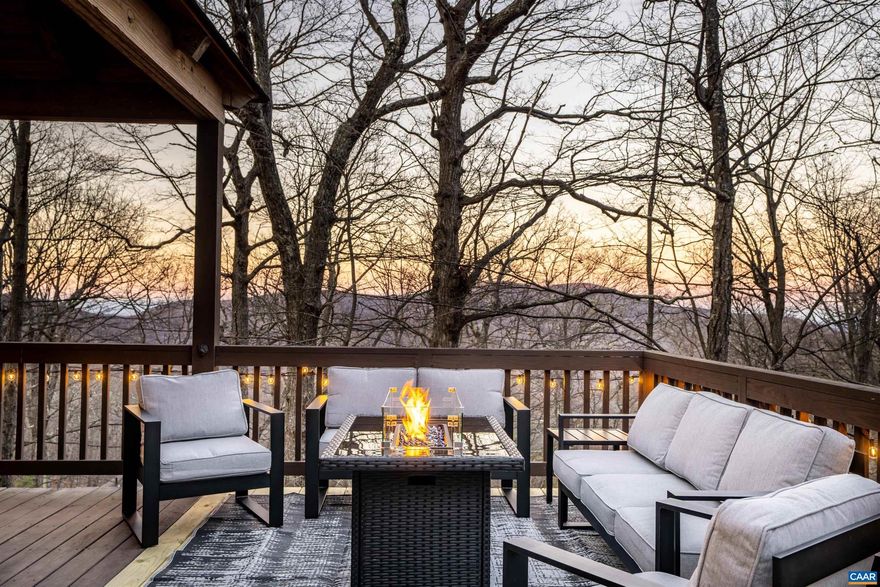 This ski property will absolutely WOW you! There are less than a handful of completely renovated treeloft style Wintergreen homes that have been upgraded to this level of high end materials, thoughtful design, and with this many amenities and extras. The elevated feel and incredible outdoor space with covered lounge area, fire pit, pizza oven, and hot tub will have you enjoying the fresh mountain air year-round. The access path to the slopes is a 45 second walk, and the house has winter views of the slopes to catch the skier action. For those needing easy access, there are just a few steps inside, directly off of the level parking pad. This home has been a popular rental property bringing in over $80K in 2025, with very happy guests and all five star reviews. Everyone has had a positive experience here, and you will too! Ask for the extensive improvements list, all of which makes this mountain getaway the definition of turnkey.,Granite Counter,Hickory Cabinets,Fireplace in Living Room