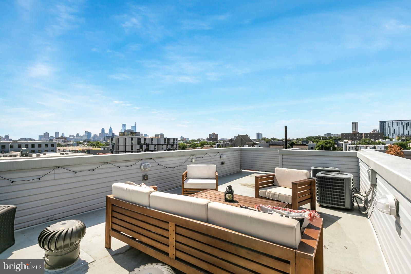 3+ YRS remaining on TAX ABATEMENT! Property eligible for a special loan program: 1% interest rate discount & no PMI. First-time buyers can receive 6% closing cost credit. No income limits--primary residence only. Welcome home to this stunning 3 bedroom / 2.5 bathroom single-family home featuring GARAGE PARKING, hardwood floors, ROOF DECK & 2 BALCONIES, recessed lighting, upper-floor laundry, central a/c, and gorgeous finishes throughout. The 1st level welcomes you into a sizable entrance room with great space for shoe & coat storage and access to the garage and basement. Head to the 2nd level for the bright & airy main open-floorplan living space where you'll have tons of room for a variety of different furniture set-ups. Your beautiful kitchen features white shaker-style cabinets, great prep space on the granite countertops, white subway tile backsplash, island with stool seating, and a full lineup of sleek stainless steel appliances. A convenient powder room rounds out the main living space. Continue upstairs to view 2 nice-sized bedrooms, 1 full bathroom, and your conveniently-located washer & dryer. The front bedroom features a juliet balcony, and both bedrooms are spacious with wall-to-wall carpeting, abundant sunlight, and good closet space. The full bathroom is equipped with a lighted vanity and a fully tiled shower / tub combo. Head up to the primary suite boasting a fantastic walk-in closet, ceiling fan for year-round comfort, and a luxurious bathroom with a dual-sink modern vanity and a large, standing shower with lovely glass doors. The private balcony off the primary suite provides the perfect spot to enjoy your morning coffee or unwind after a long day. Head up one more level to the expansive roof deck with amazing unobstructed skyline and city views! On the lower level is an unfinished basement for additional storage. Walkable to the best that Fishtown and Olde Kensington have to offer: Human Robot, Suraya, Middle Child Clubhouse, Laser Wolf, Jaffa, Pizzeria Beddia, Wm Mulherins, La Colombe, and more! Convenient access to shopping, parks, and public transportation. Walkable to Cruz Playground, Hancock Playground, and Benson Park. Schedule your showing today!