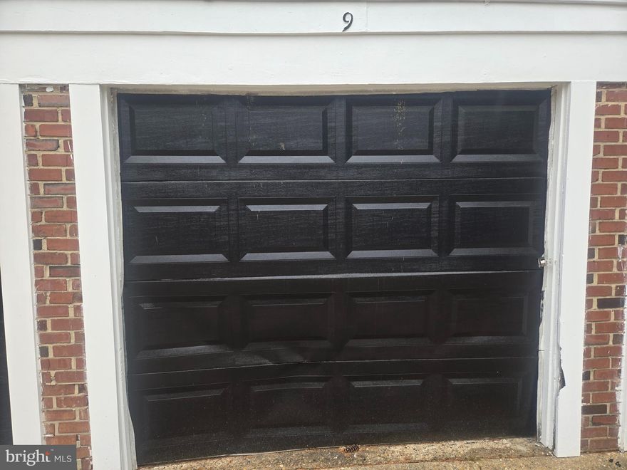 Individual 1-car garage (P-9) at 2036 Fort Davis St SE - No Residence. An opportunity to own your own garage with parking being at a premium. This is located on a row of garages and equipped with a manual garage door. The dimensions are approximately 16 feet long by 8 feet wide and 6.8 feet tall, it’s practical space for a vehicle or other stored items.  It appears as though the garage door was damaged by a car. The door can be replaced or a possible price adjustment.