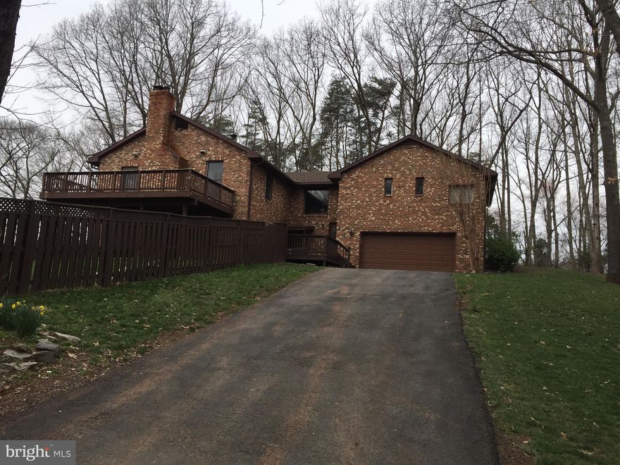 **SOLD AS IS** IN GROUND POOL CURRENTLY USING POOL SERVICE TO MAINTAIN, 3 SIDE BRICK, NEW ROOF 2018, NEW SIDING 2018, FULL HOUSE GENERATOR W/PROPANE TANK, 2 ELECTRIC HOT WTER HEATERS 75 GALLONS EACH, GUTTER GUARDS, GREAT POSSIBILITIES FOR BUYER WANTING TO PUT IN SOME TLC. BEAUTIFUL VIEW, WALK OUT BASEMENT,.