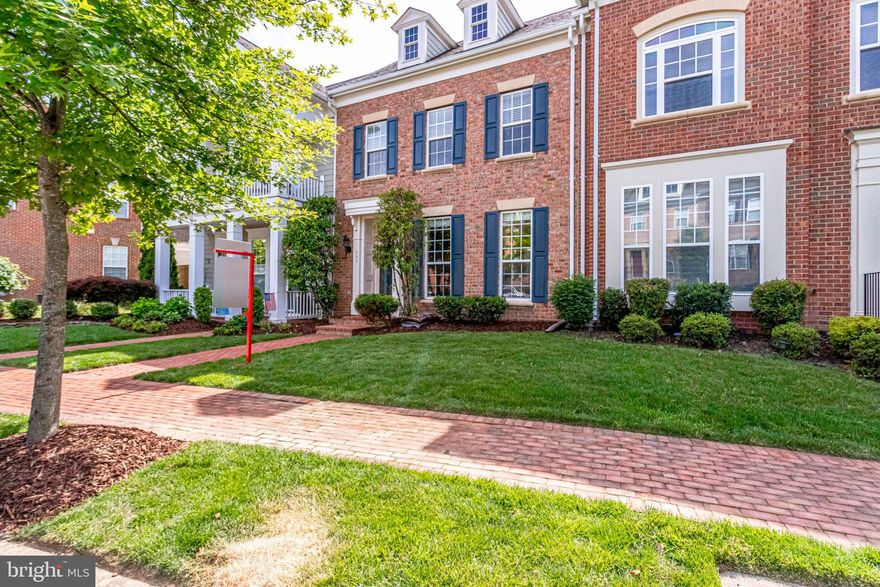 BACK OUT ON THE MARKET!!!! COMMUTERS DREAM - VRE IN COMMUNITY!!! Award winning "Miller & Smith" home in the gorgeous Belmont Bay marina community! Come tour this unique and move-in ready large two level townhouse. The main level of this home features tall 9+ ceilings wrapped in crown moulding with freshly painted luxurious Sherwin Williams Repose Grey paint. Included in this open floor plan is a gourmet kitchen with an extra long granite island that easily welcomes entertaining friends and neighbors in addition to its functionality and ample counter space. New stainless steel appliances have been installed featuring double ovens, a french door refrigerator, quiet-run dishwasher and gas cooktop. Other kitchen features include a natural stone backsplash and 42" white cabinets. Off the kitchen there is a unique atrium that provides a wonderful private outdoor space! Hardwood floors run throughout the main level & upper gallery/study area. The Master Suite is one of the major highlights of the home and is truly like no other town house (18' walk-in closet, a sitting room, a deluxe bath that includes an inviting soaking tub). You only have to travel two blocks to experience the Occoquan water front with a walking/running path along side of the community marina and wildlife preserve. There are many things to do including boating, playing tennis with friends or sunbathing at the community pool! VRE station is in the neighborhood and you would be minutes to public transportation & major highways. You owe it to yourself to come tour this amazing home!  Agent-Owner.