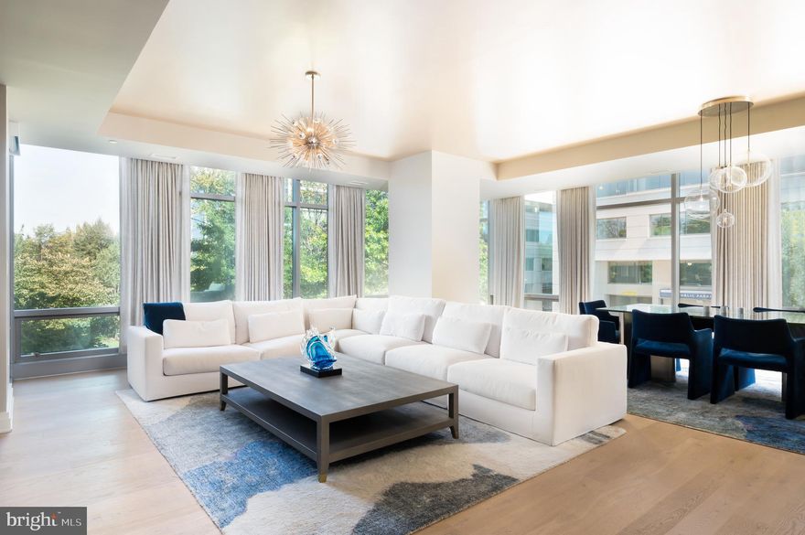 Indulge in the epitome of urban sophistication with this meticulously designed two bedroom plus den, two and a half bathroom condominium nestled in sought-after West End.

Step inside and be captivated by an open concept floor plan, adorned with pristine wide-plank white oak hardwood floors and an abundance of natural light pouring in through dual exposure floor to ceiling windows. Step out onto the private balcony and be greeted by sweeping vistas of Francis and Rock Creek Park.

The kitchen stands as a masterpiece of culinary artistry with sleek contemporary cabinetry, paneled Bosch and Thermador appliances, and an expansive island perfect for meal preparation or as a gathering point for friends and family.

Retreat to the spacious primary suite which offers dual custom walk-in closets and a luxurious en-suite bathroom. The second bedroom is equally inviting and complete with a well-appointed en-suite bathroom. The den is a versatile space, ideal as a home office or personal sanctuary. The ultimate urban experience is complete with two car secure garage parking,

Residents of Westgate enjoy a 24-hour concierge, an on-site manager, club rooms, a fitness center and rooftop terrace. Situated in a coveted DC locale, you’ll find yourself moments away from an array of cultural experiences, world-class dining, shopping, and parks.